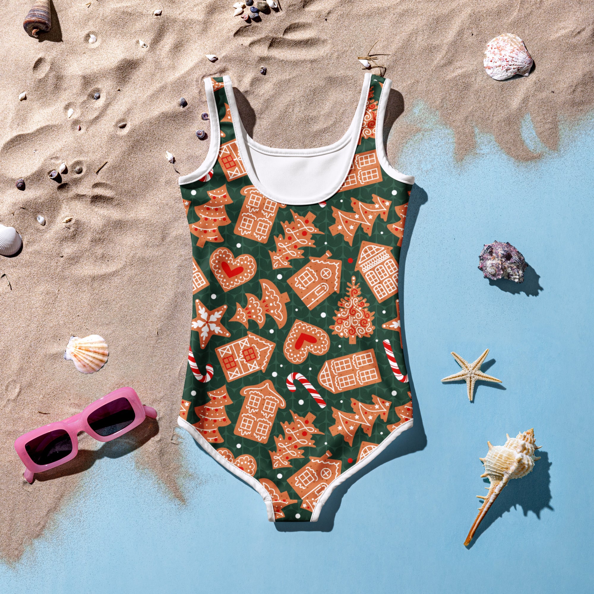 Girls green gingerbread cookie buttery soft swimsuit with UPF 50 featuring festive gingerbread house and candy cane pattern