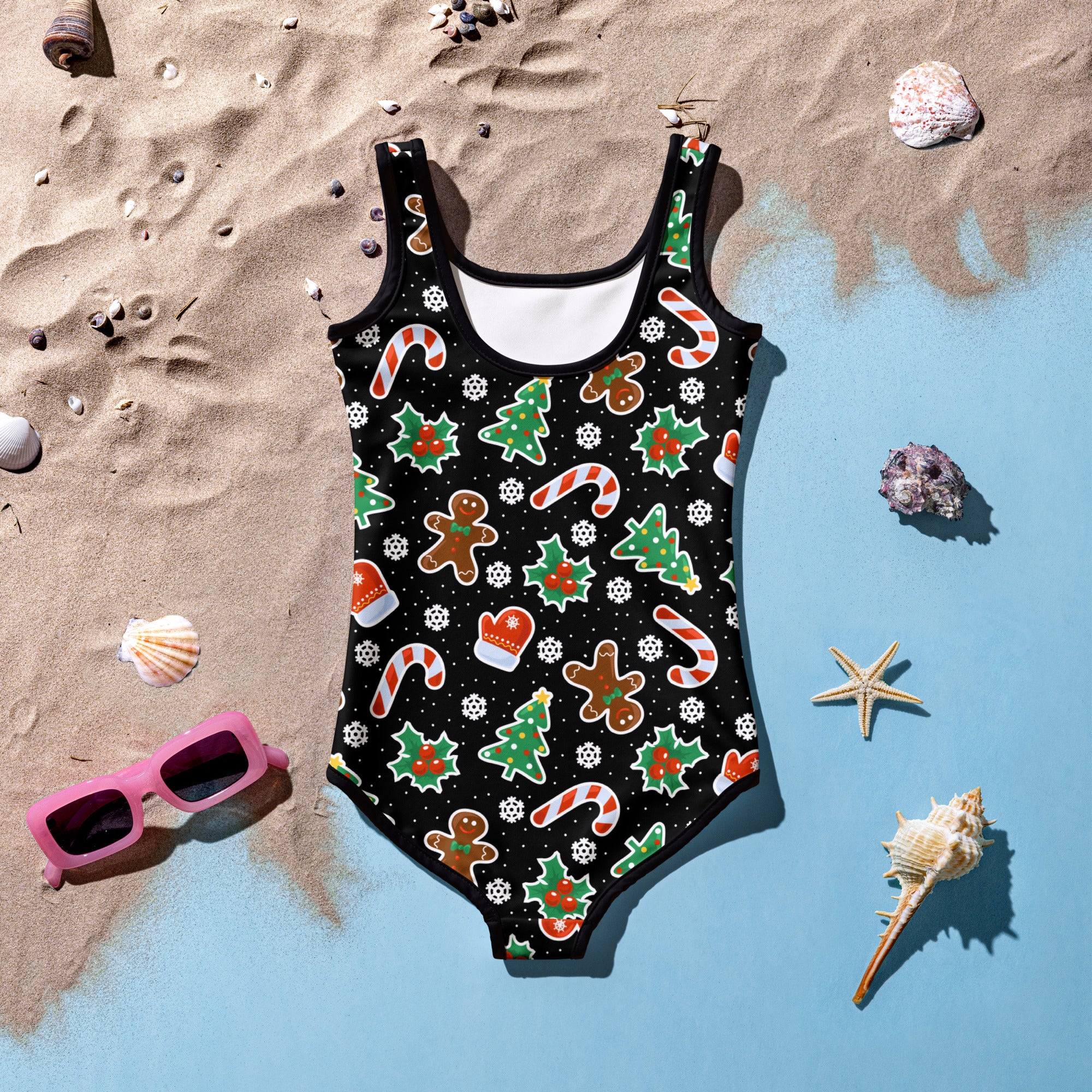 Girls black one-piece Christmas cookie swimsuit with buttery soft fabric UPF 50 festive gingerbread print