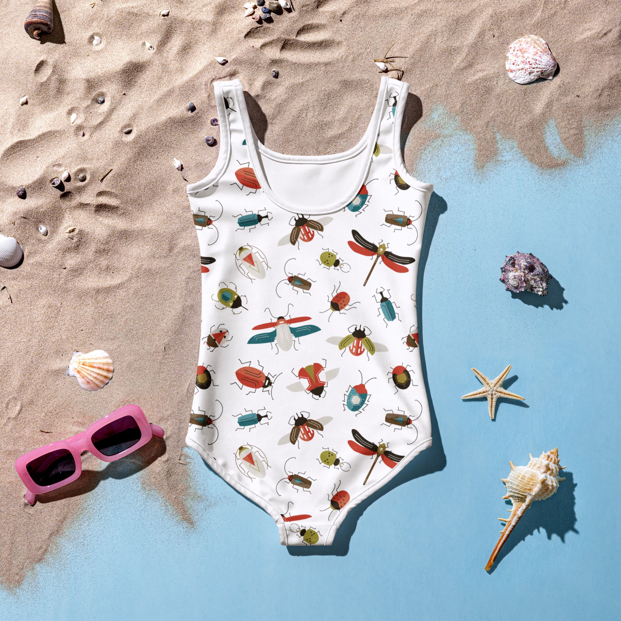 White buttery soft girls one-piece swimsuit with colorful insects and dragonflies pattern and upf 50 plus protection