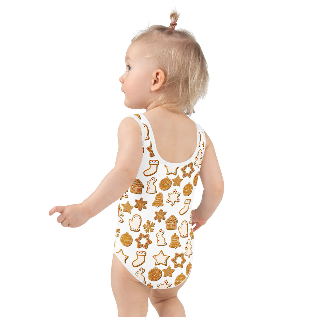Girls white one-piece swimsuit with gingerbread holiday pattern buttery soft fabric and upf 50 plus protection
