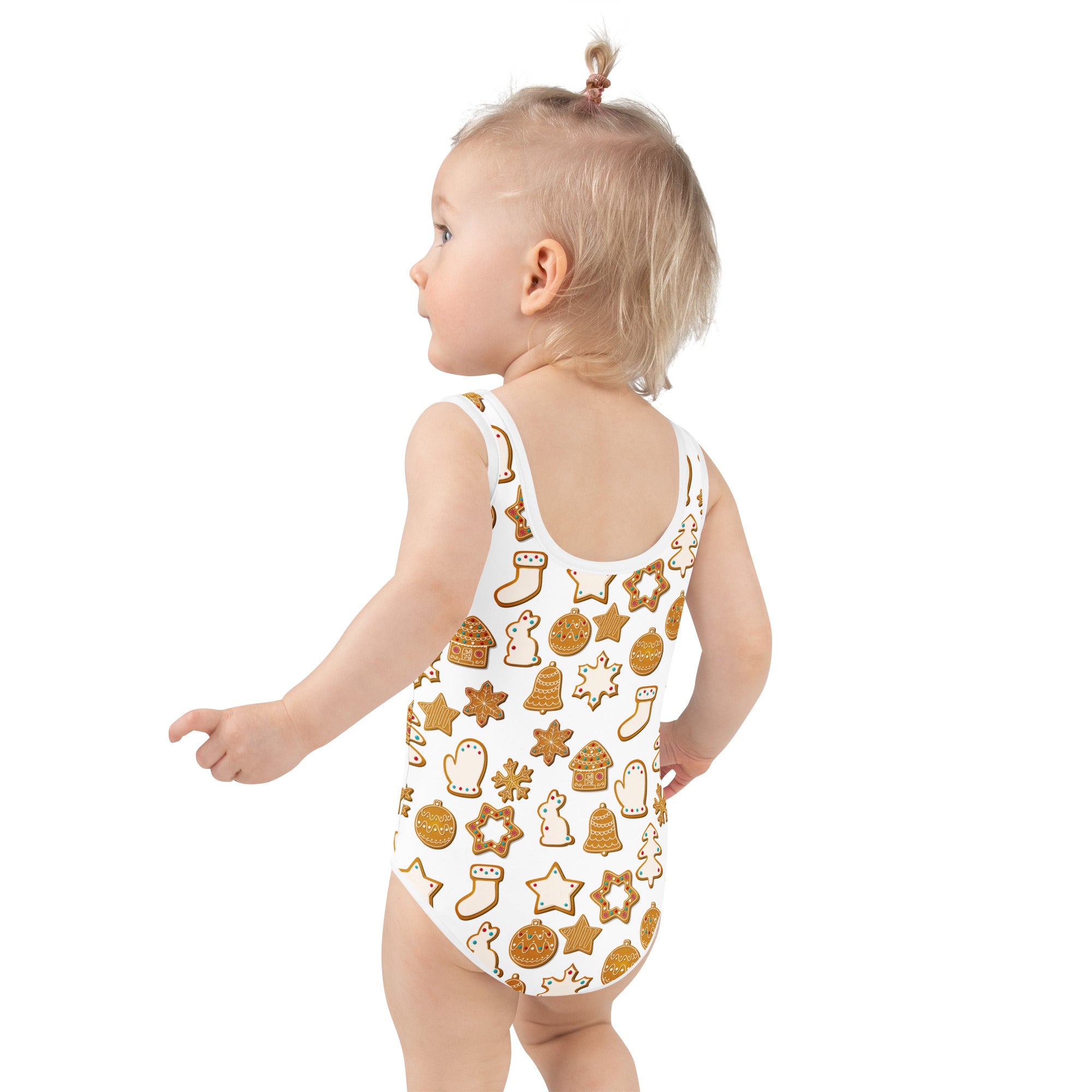 Girls white one-piece swimsuit with gingerbread holiday pattern buttery soft fabric and upf 50 plus protection