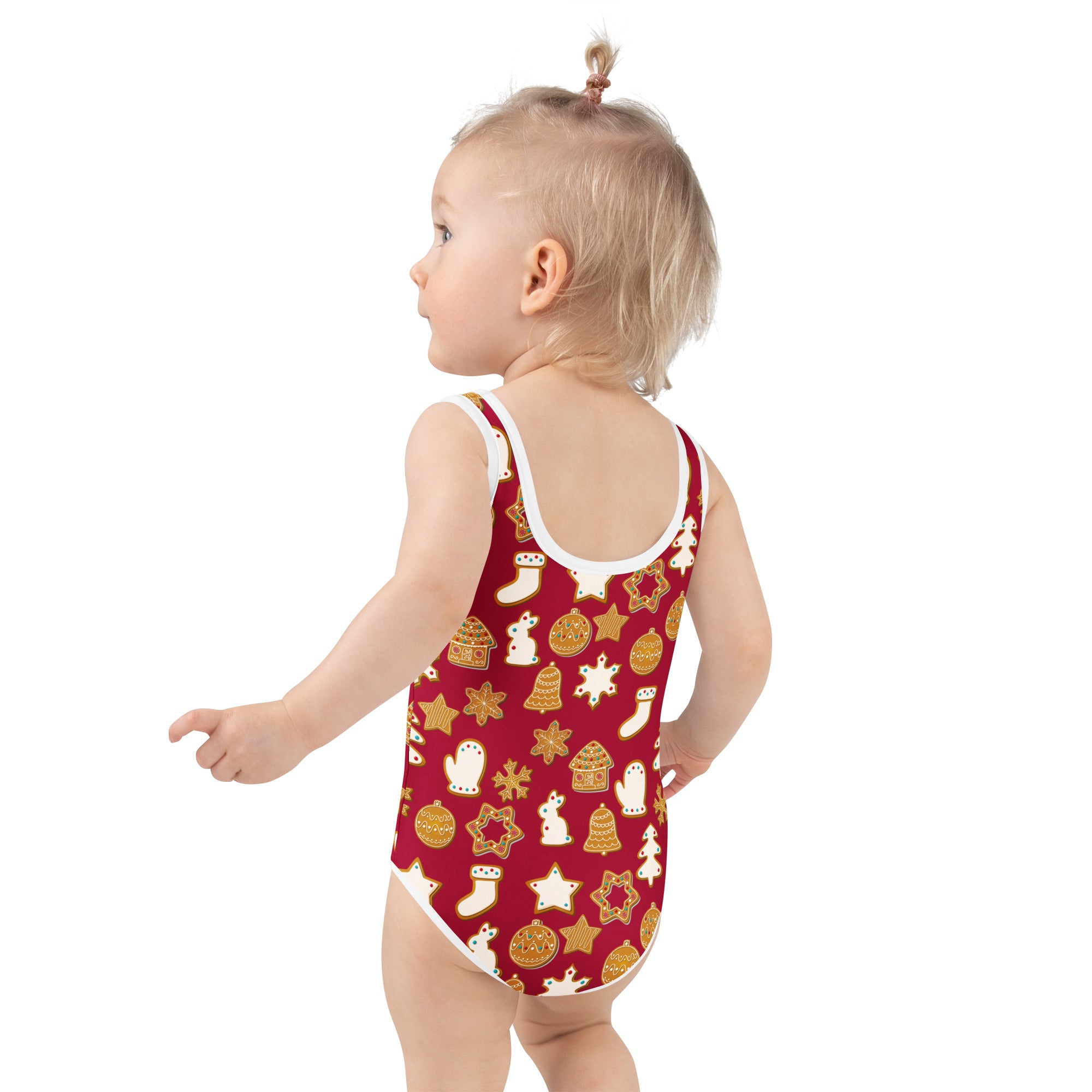 Girls red one-piece swimsuit with white and gold holiday motifs buttery soft fabric and upf 50 plus protection