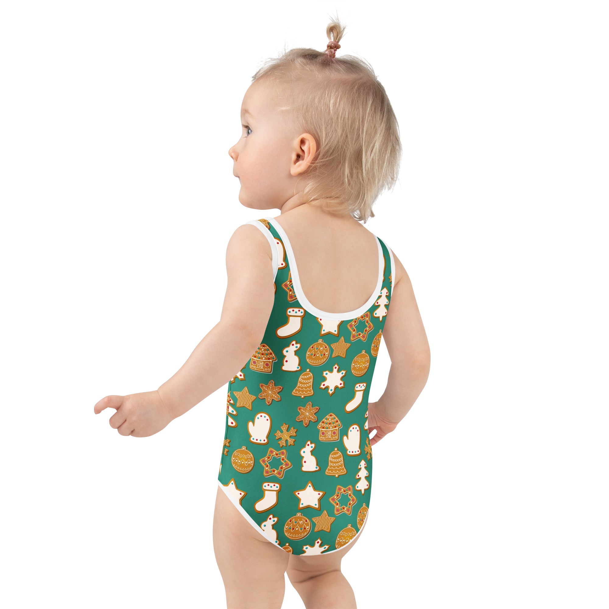 Girls green buttery soft one-piece swimsuit with white trim and festive gingerbread cookies print and UPF 50+ protection