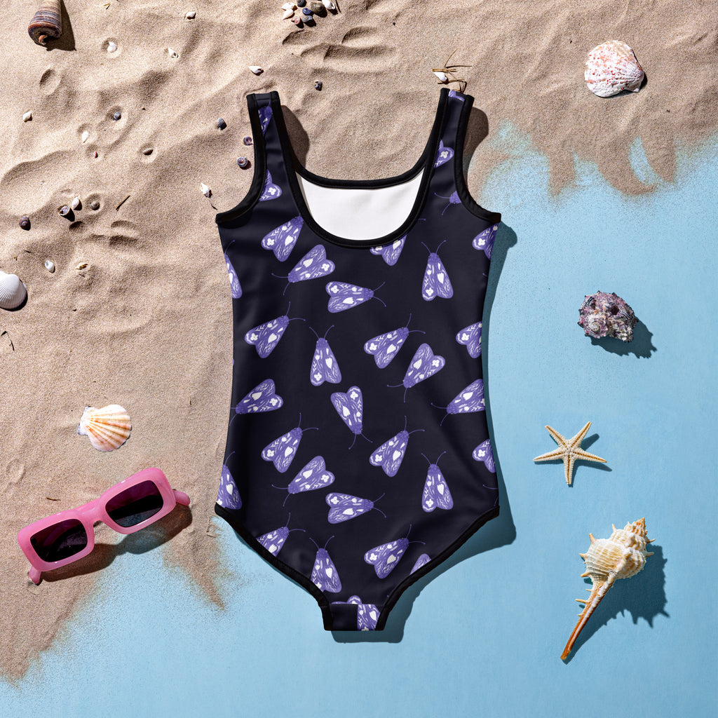 Girls purple moths buttery soft black one-piece swimsuit with purple moth pattern black trim and upf 50+ protection