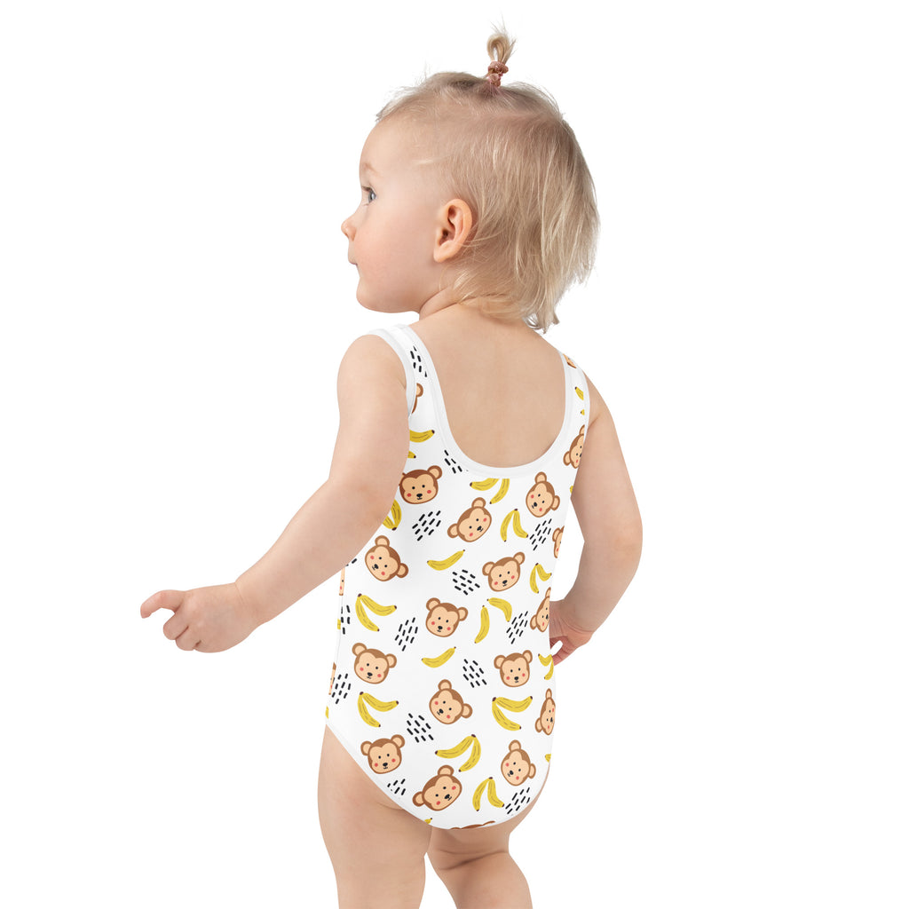 Girls monkeys and bananas buttery soft white swimsuit with playful brown monkey and yellow banana pattern upf 50+