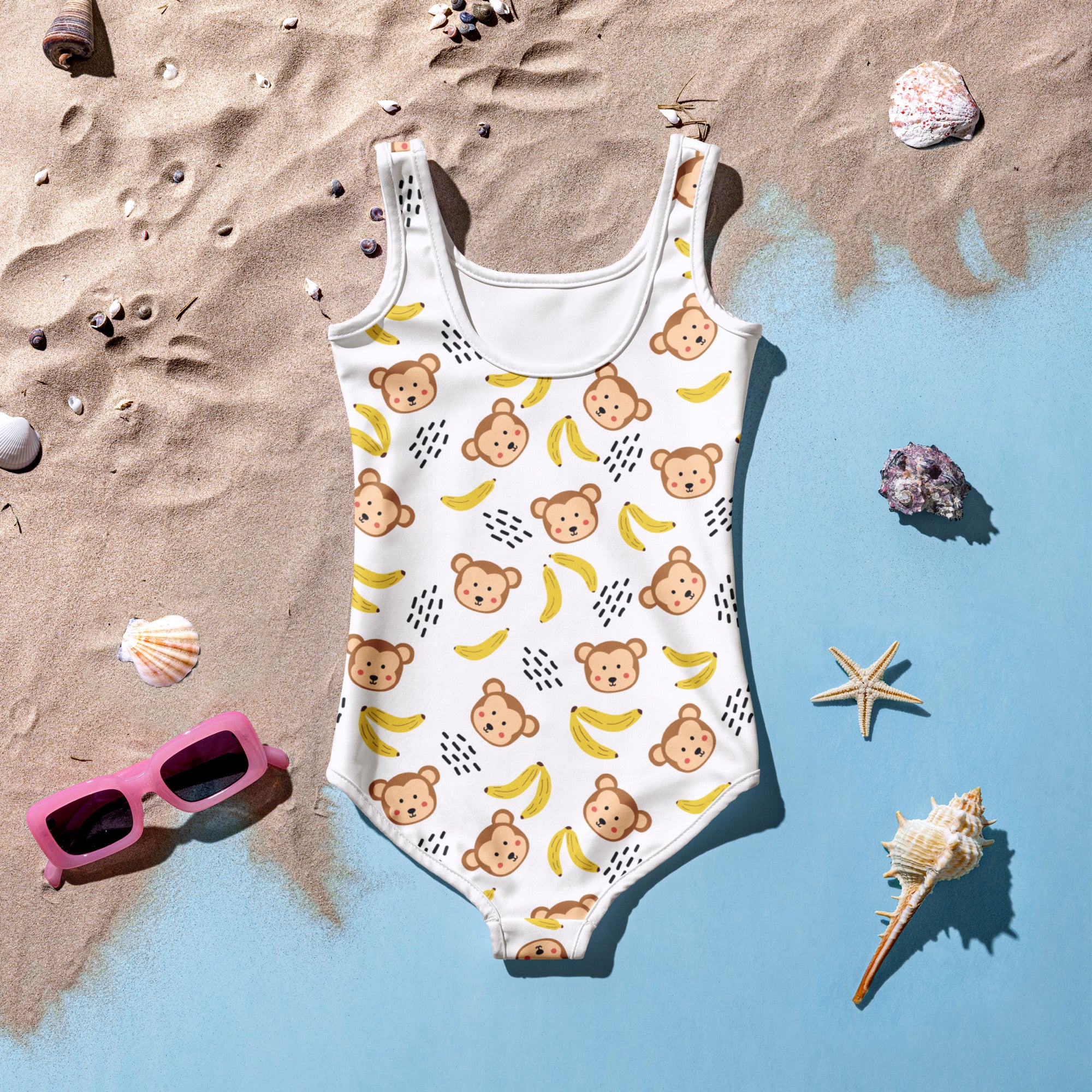 White girls one-piece swimsuit with playful brown monkeys and yellow bananas pattern buttery soft fabric upf 50+