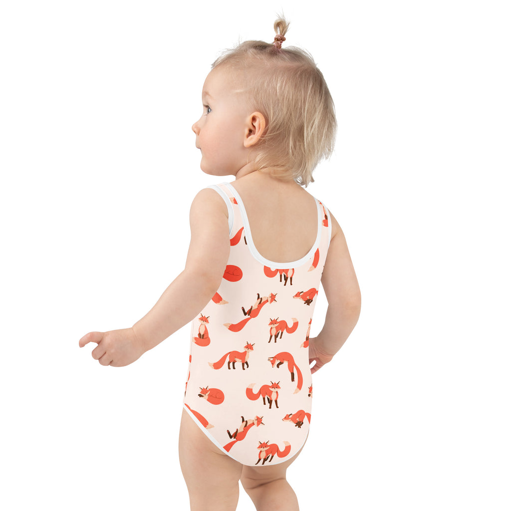 White one-piece baby bodysuit with orange fox pattern buttery soft fabric and upf 50 plus protection