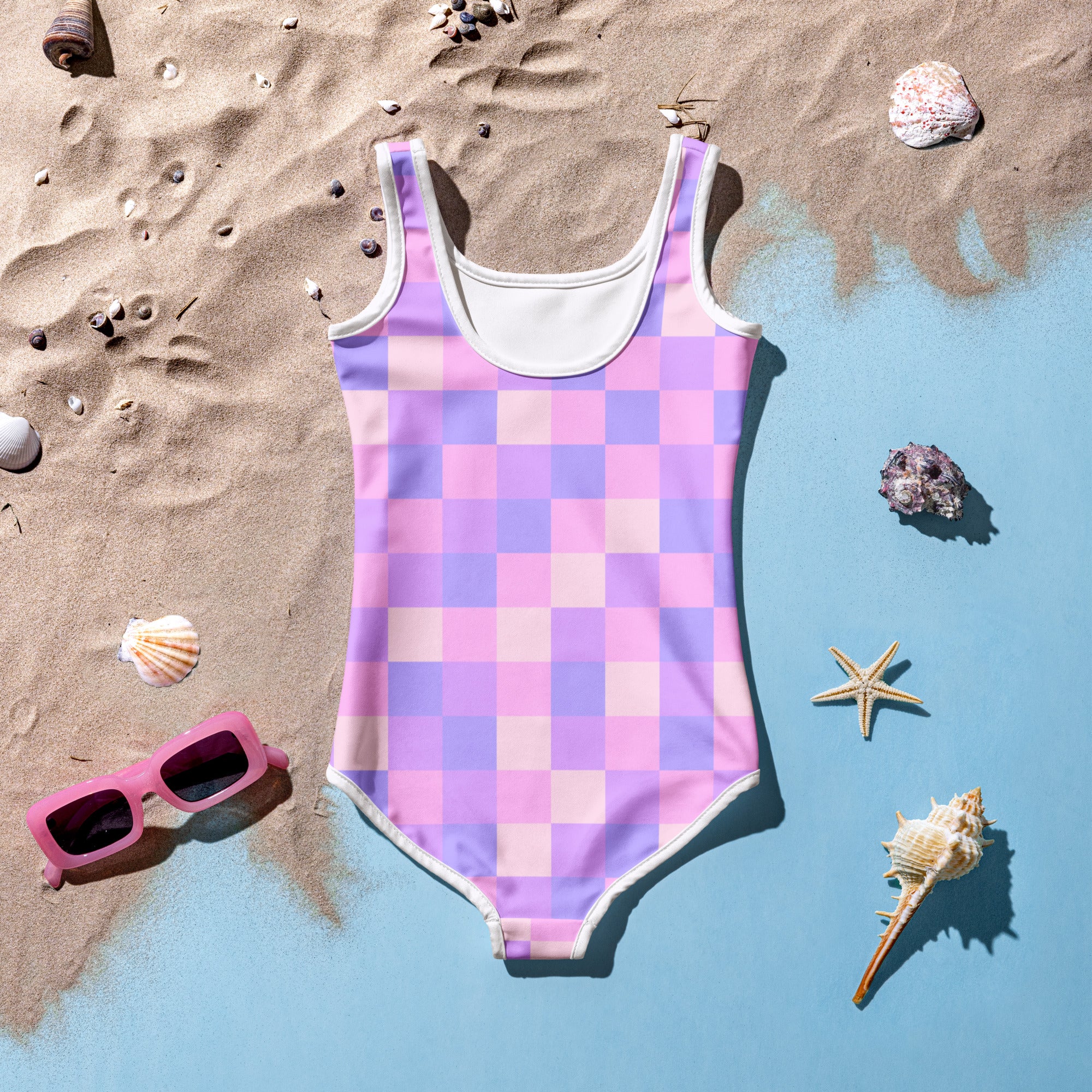 Girls pastel purple checkered one-piece swimsuit with buttery soft fabric white trim and UPF 50 plus sun protection