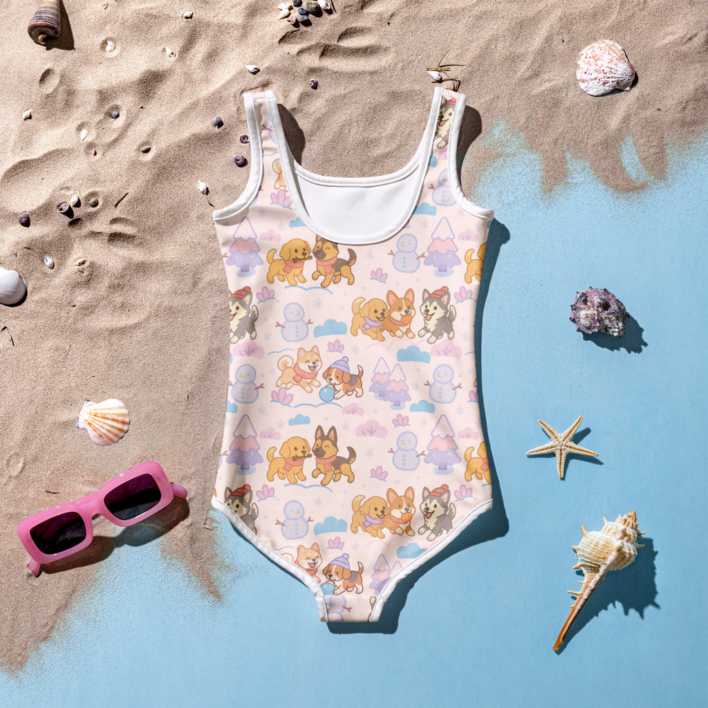 Girls winter dog buttery soft swimsuit in pastel pink with cartoon dogs snowmen trees and upf 50 plus protection
