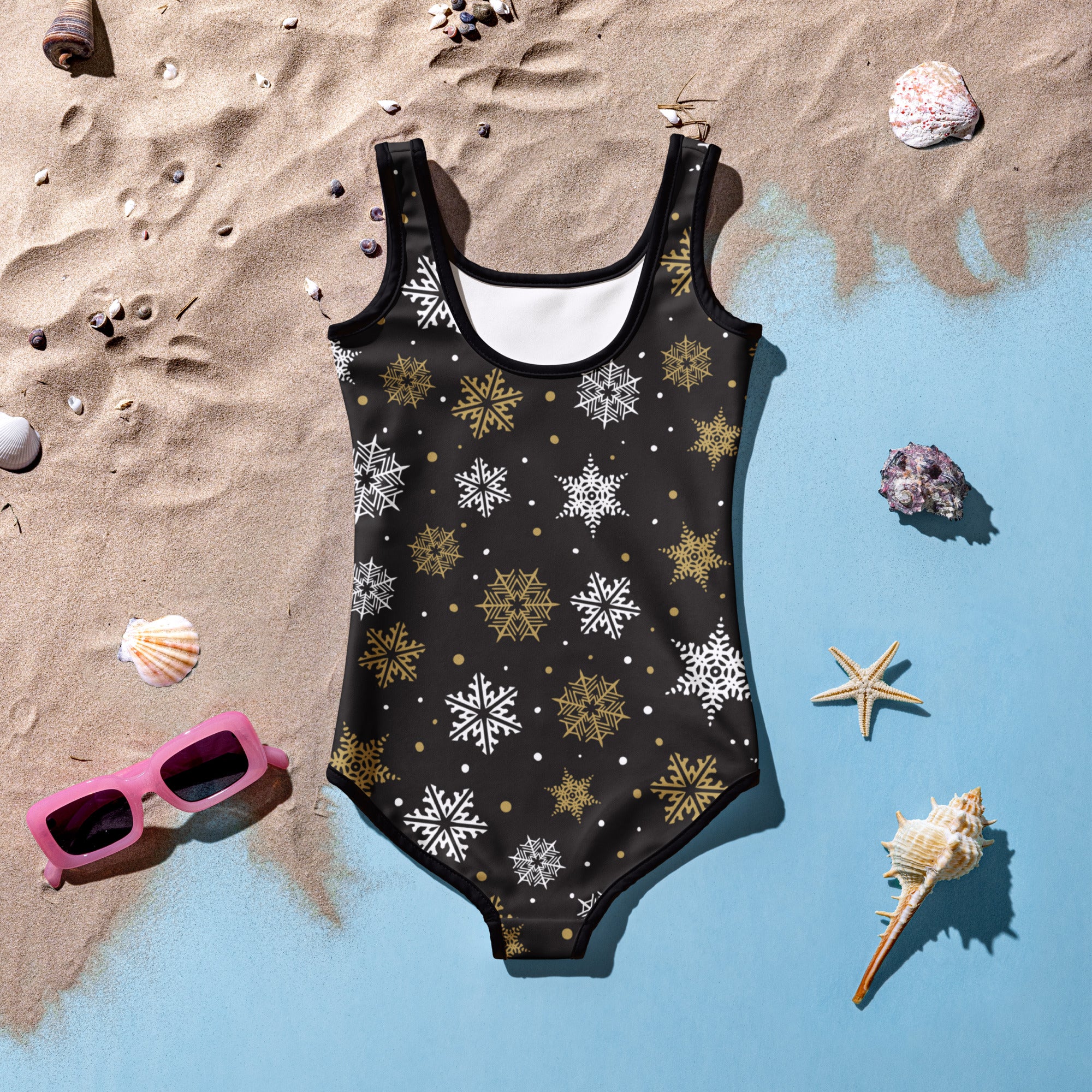 Girls black and gold snowflake swimsuit made of buttery soft fabric with UPF 50 plus for Christmas use