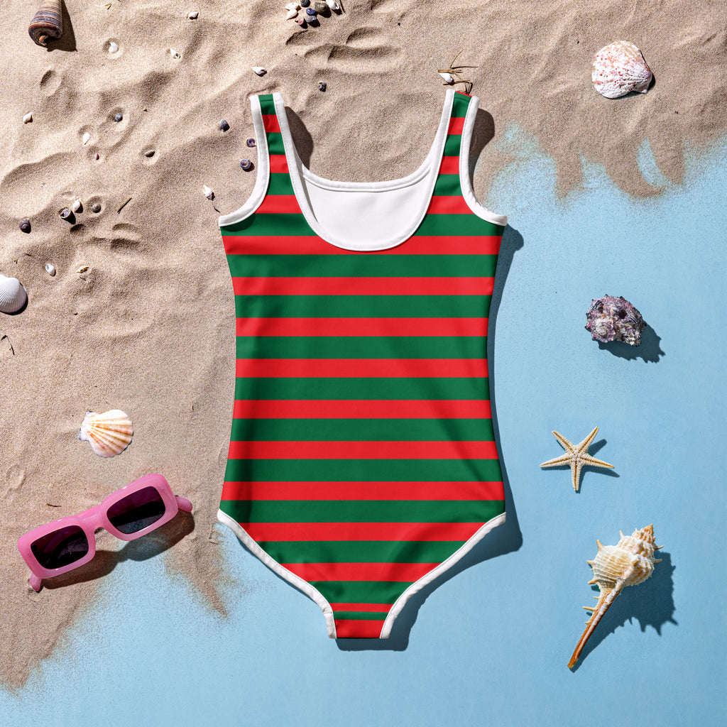A vibrant red and green striped girls festive christmas swimsuit with white trim and buttery soft fabric with UPF 50+ protection
