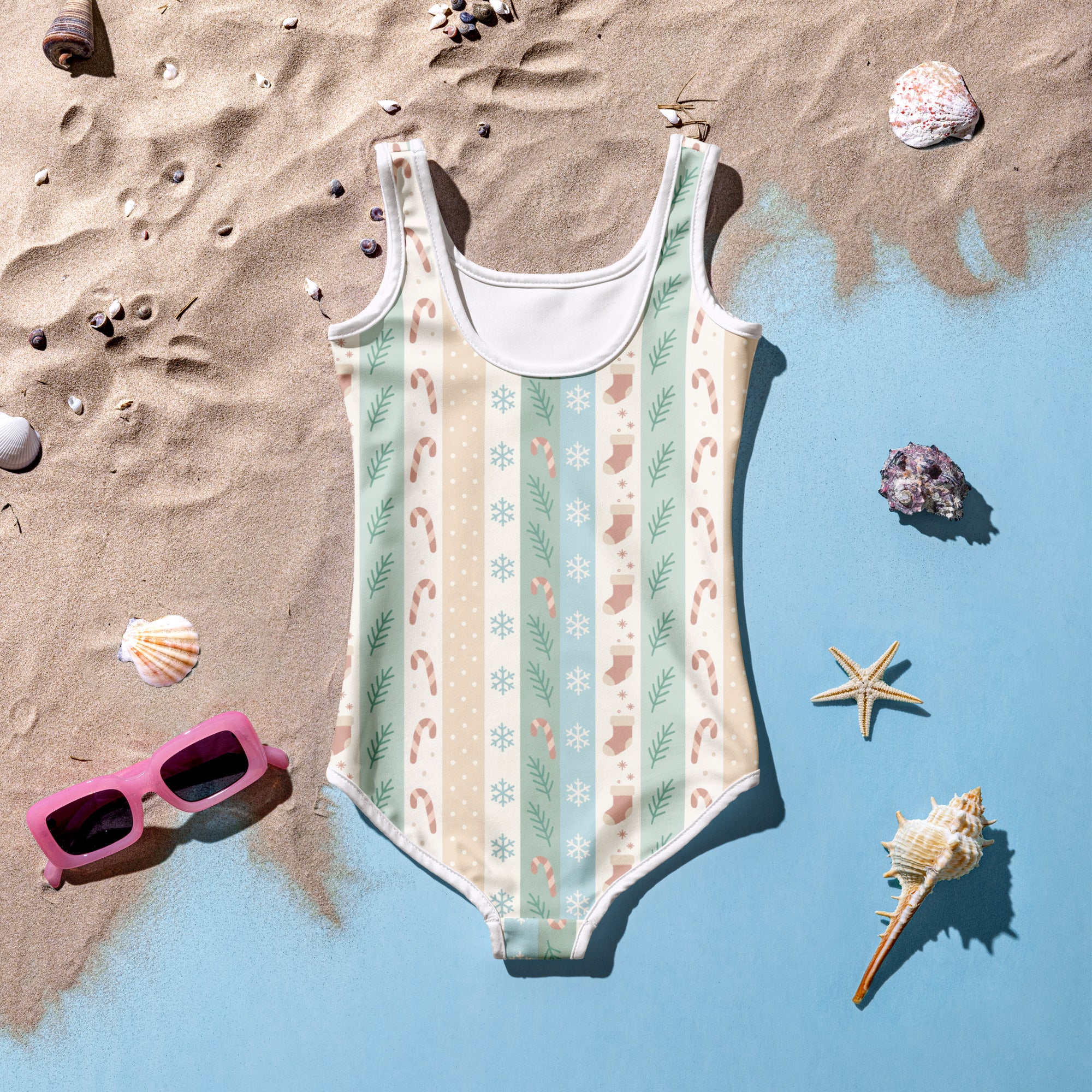 Girls pastel christmas stripe buttery soft one-piece swimsuit in mint green beige and pink with candy cane snowflake and stocking patterns