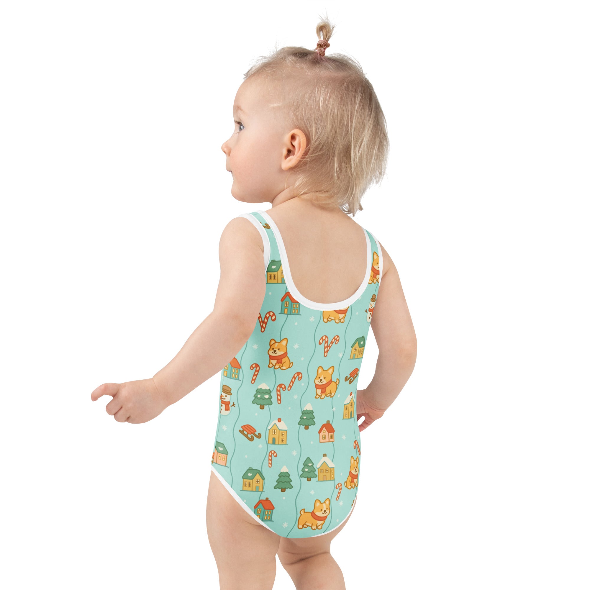 A light blue girls christmas shiba inu buttery soft swimsuit with upf 50 plus featuring orange corgis and festive patterns
