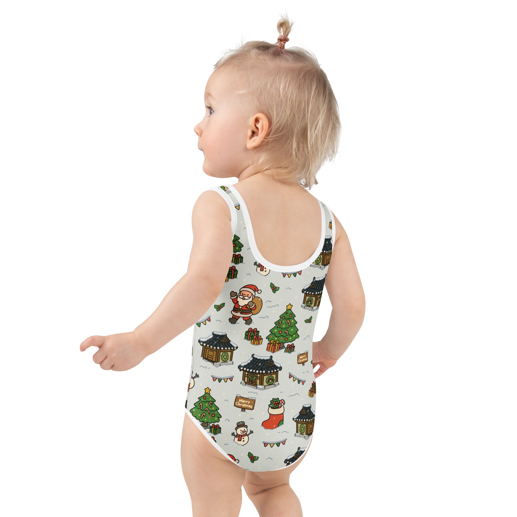 White girls one-piece swimsuit with buttery soft fabric and festive santa and christmas village prints with UPF 50+