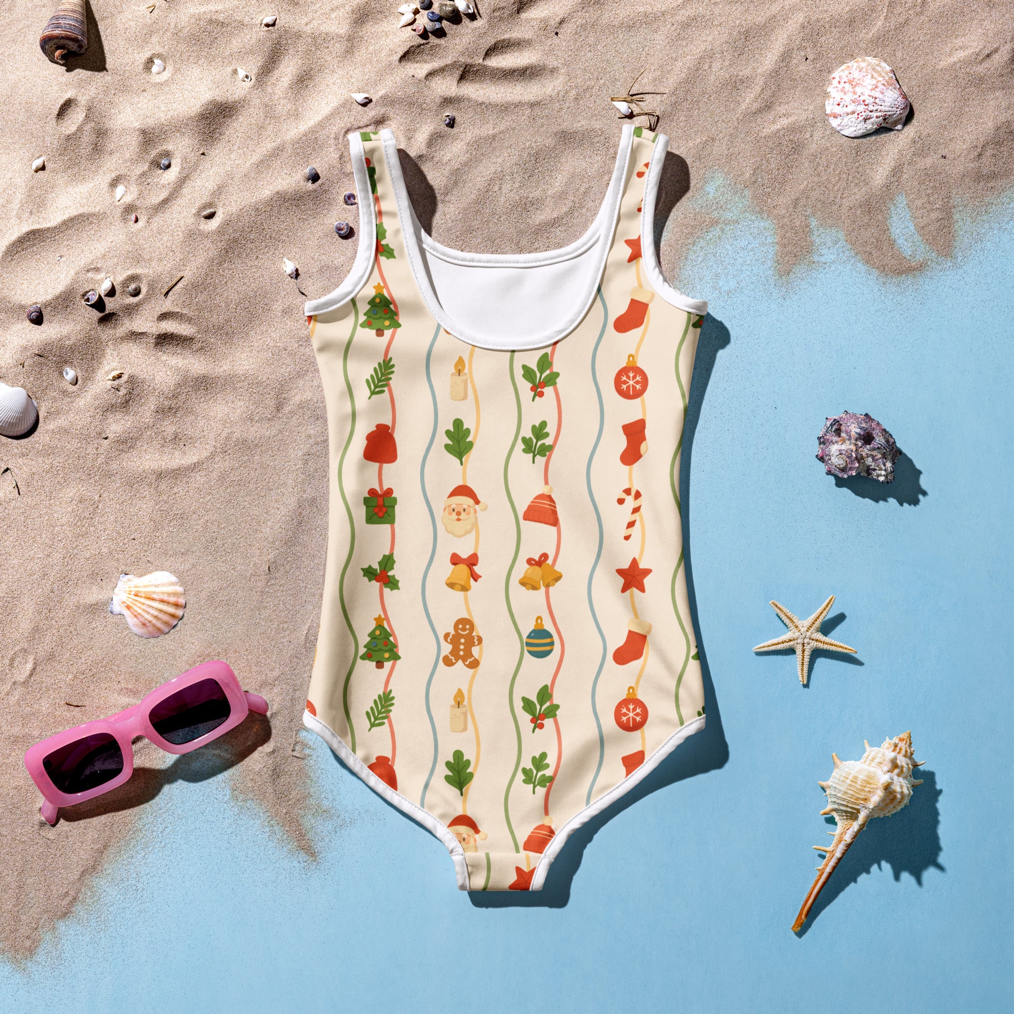 A festive cream-colored girls christmas garland buttery soft one-piece swimsuit with white trim and holiday patterns