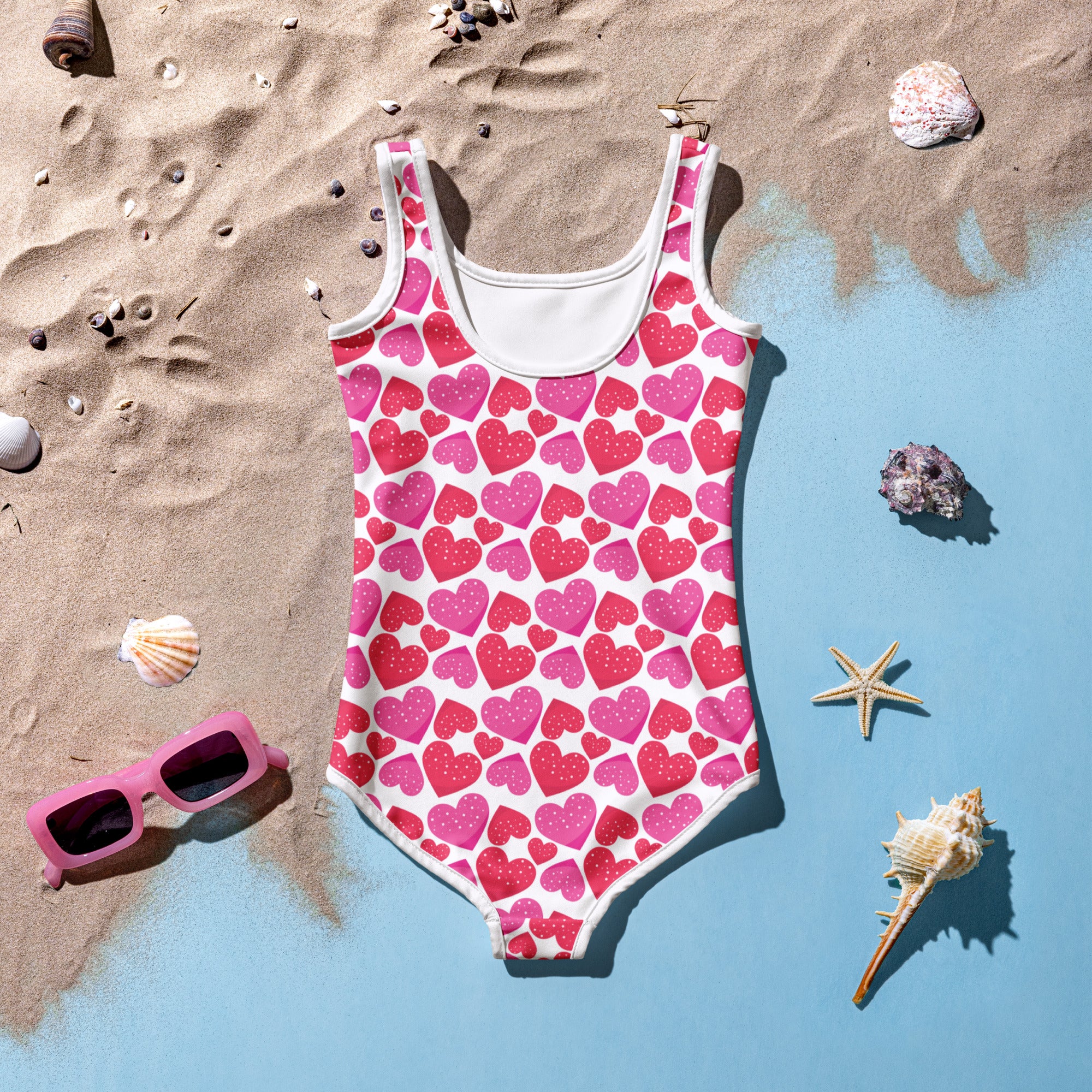 Girls pink hearts buttery soft one-piece swimsuit with double layered front and UPF 50 plus sun protection