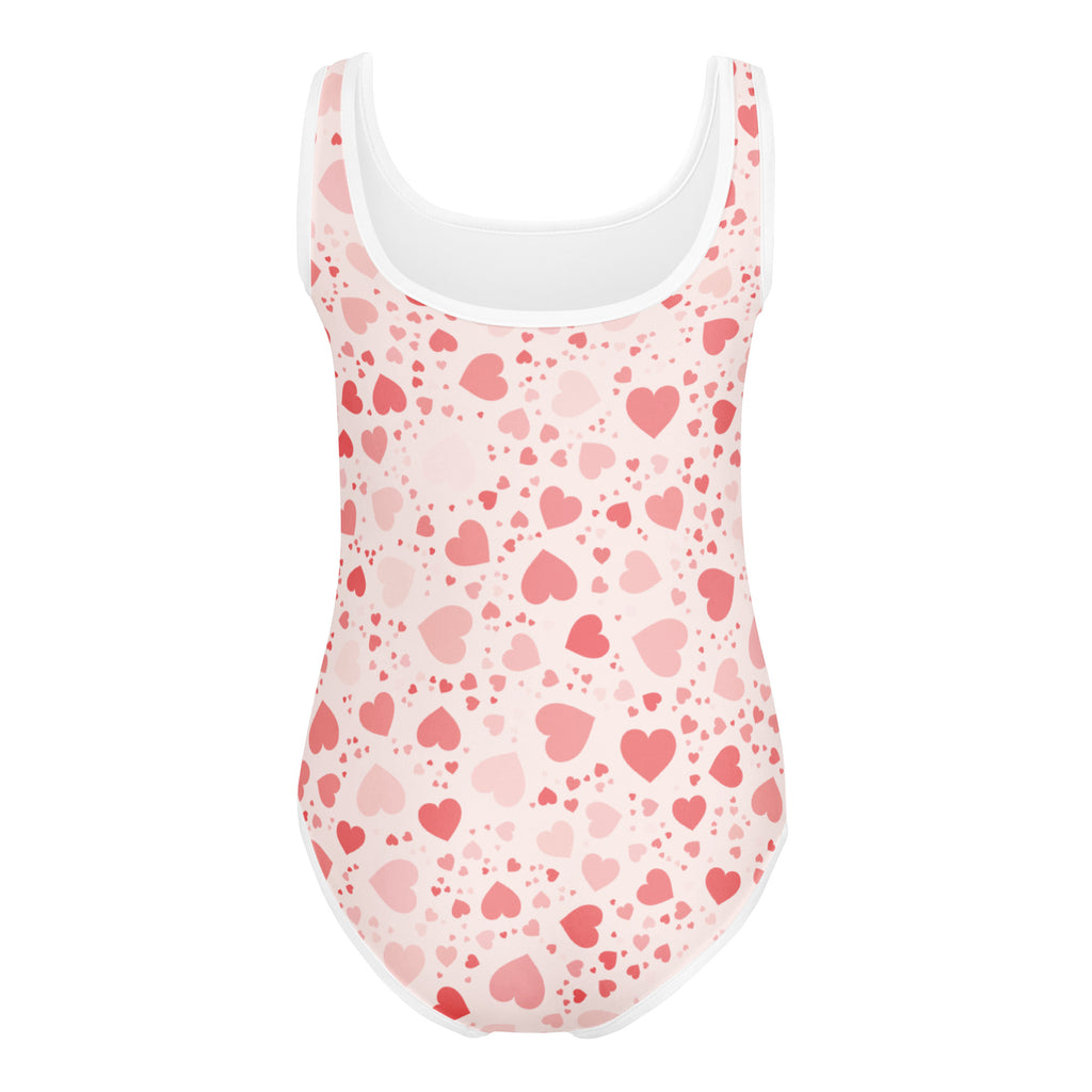 Girls pink hearts buttery soft leotard with white trim featuring scattered red and pink hearts for dance and gymnastics