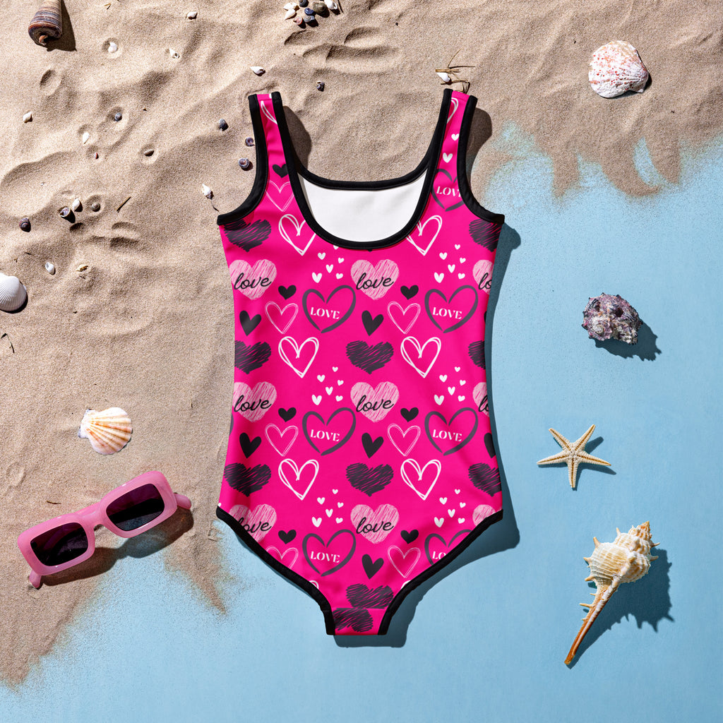 Girls Valentine’s Day pink heart one-piece swimsuit with black trim buttery soft fabric UPF 50 plus double layered front