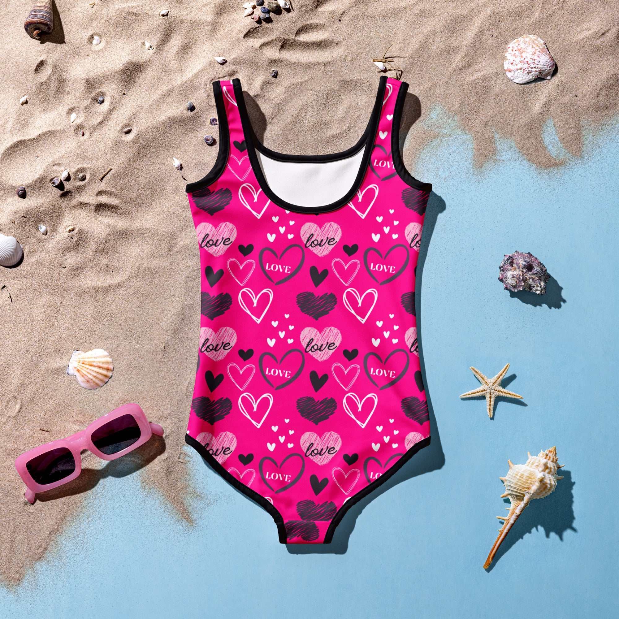 Girls Valentine’s Day pink heart one-piece swimsuit with black trim buttery soft fabric UPF 50 plus double layered front