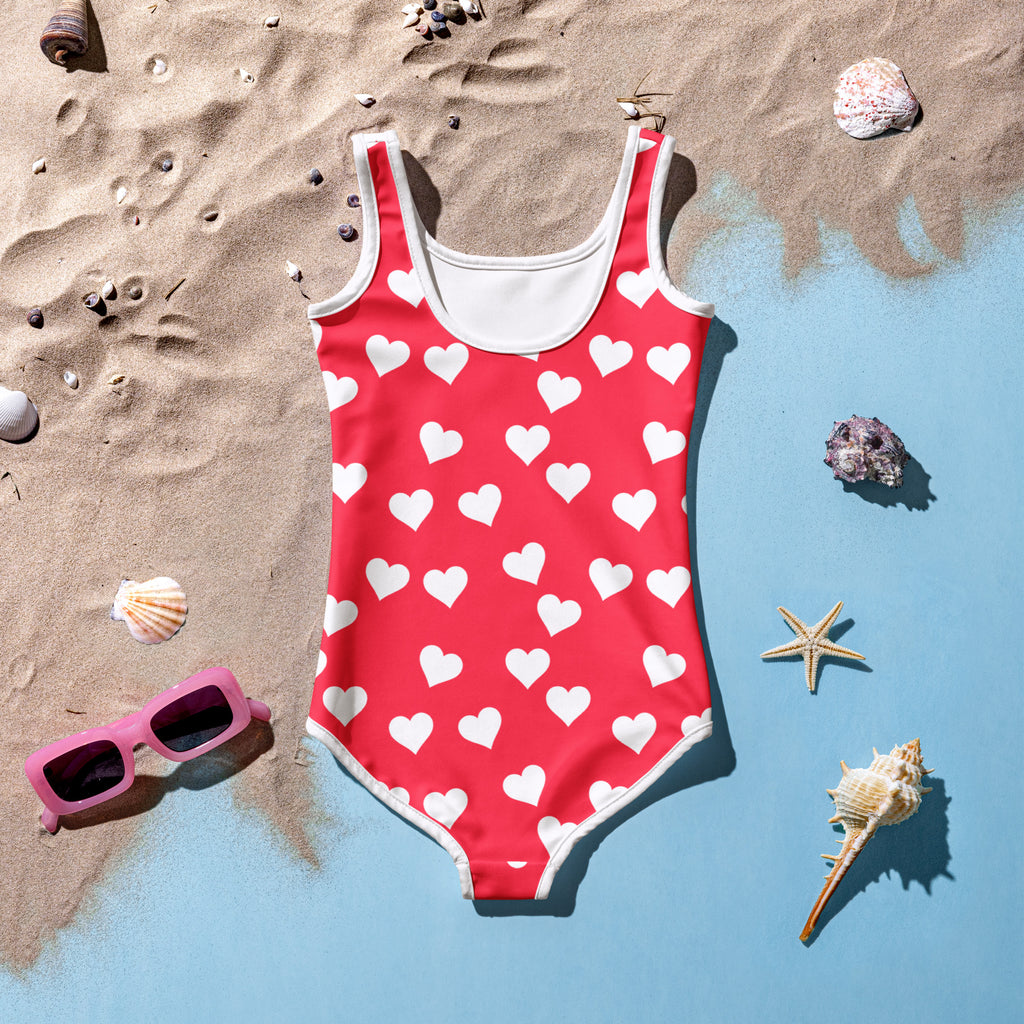 Girls red heart buttery soft swimsuit with white trim and UPF 50 plus sun protection in a one-piece design