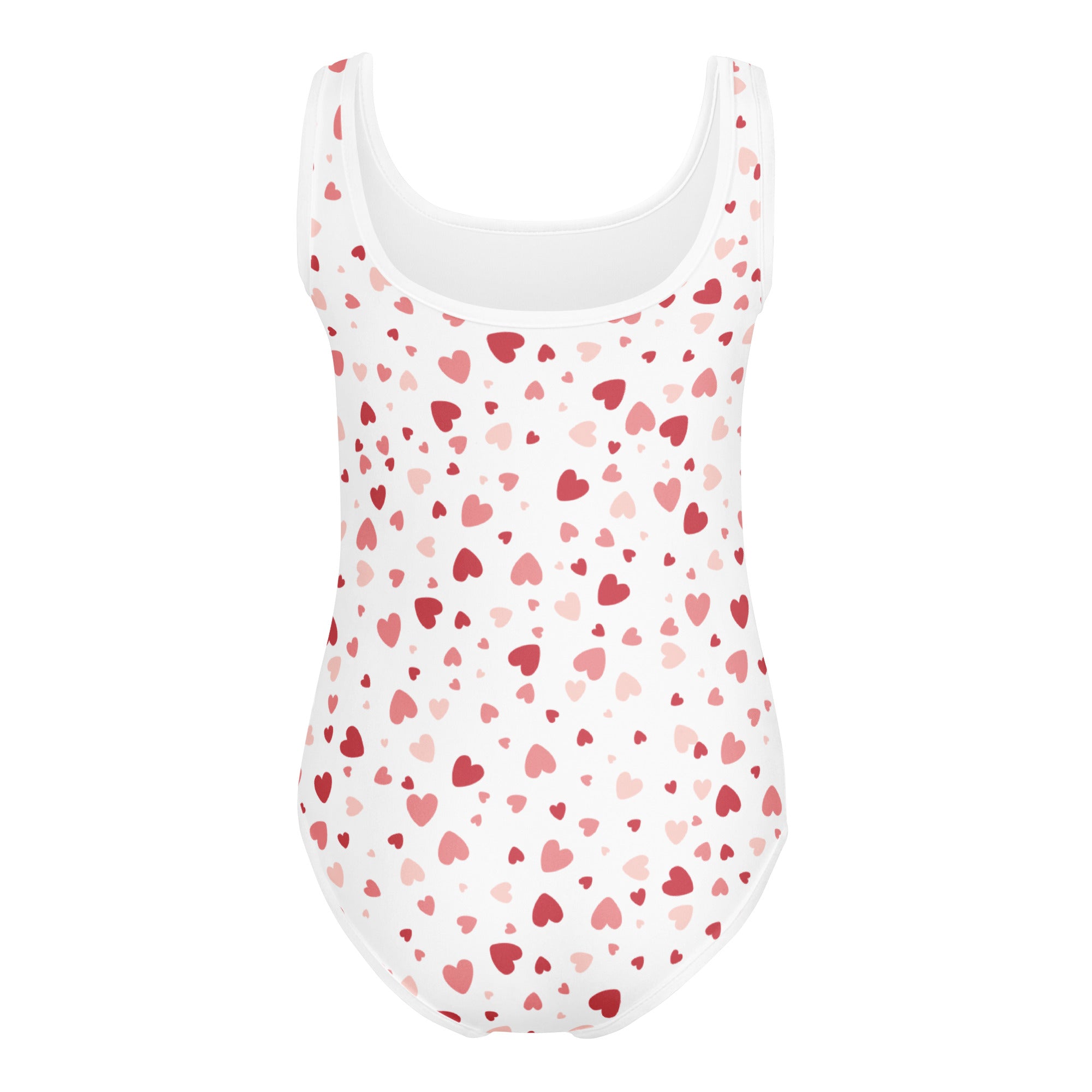 White one-piece swimsuit with scattered red and pink hearts made of buttery soft fabric for dance and gymnastics