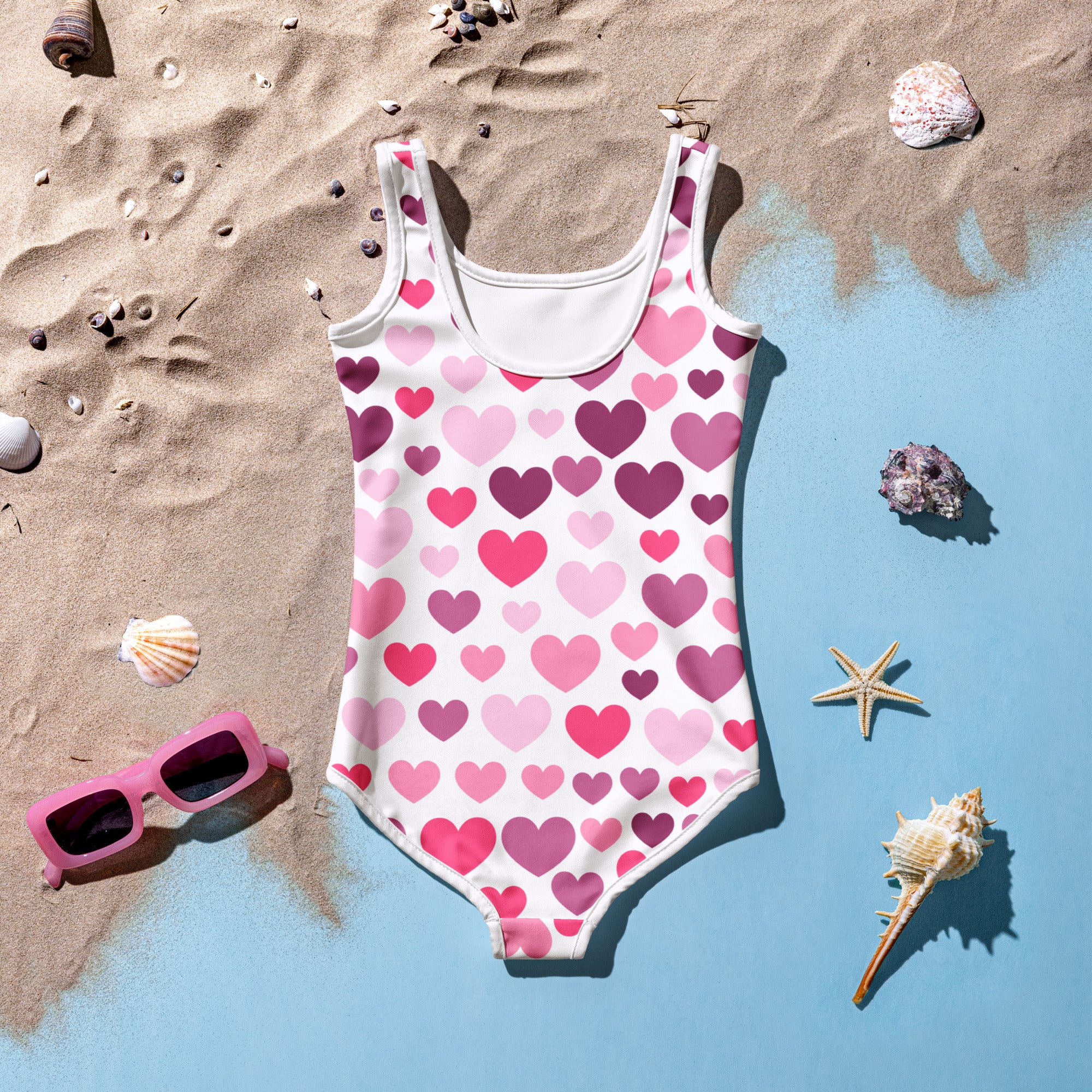 Girls purple and pink hearts buttery soft white swimsuit with upf 50 plus and double layered front detail