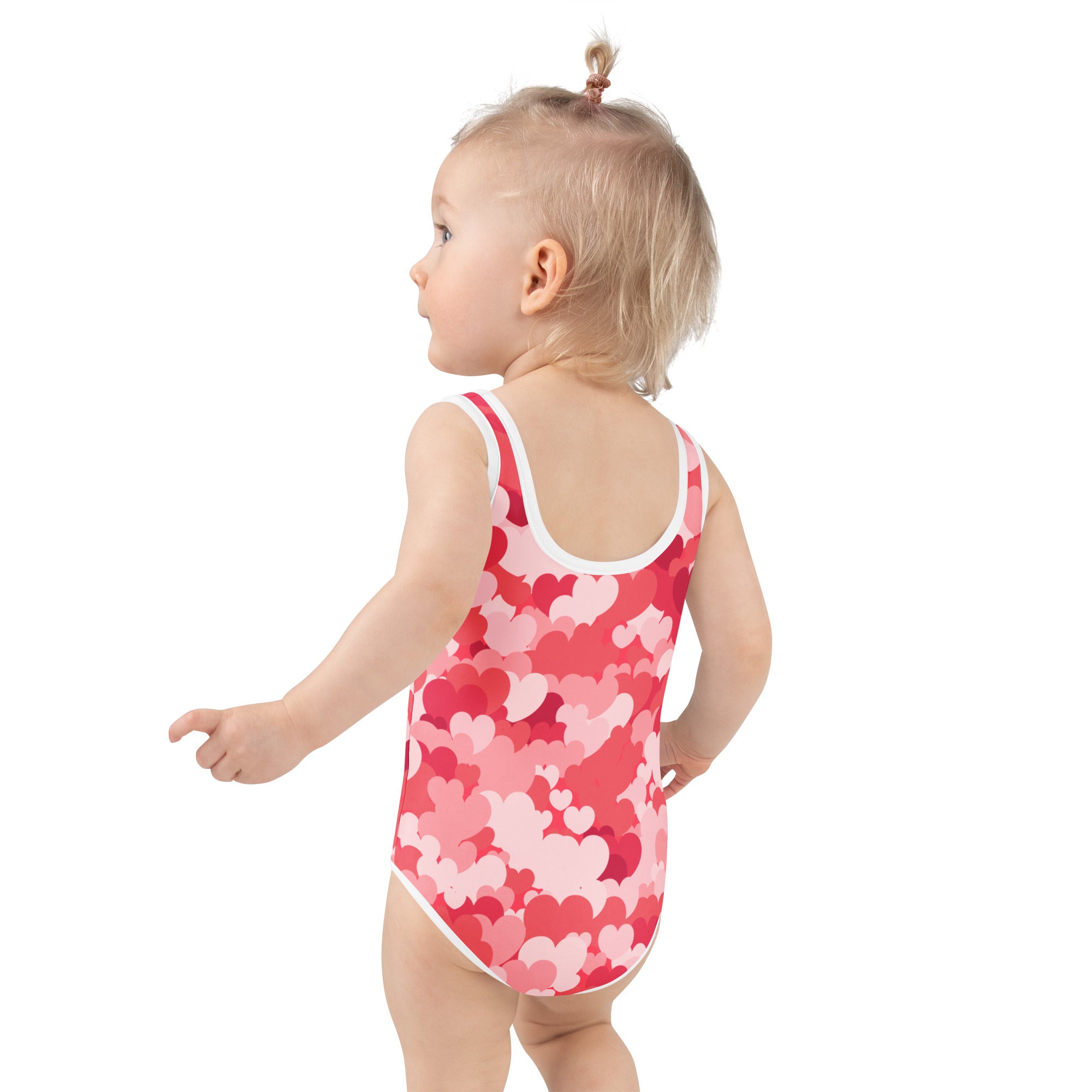 Girls pink and white heart-patterned one-piece swimsuit for toddlers buttery soft with upf 50 plus protection
