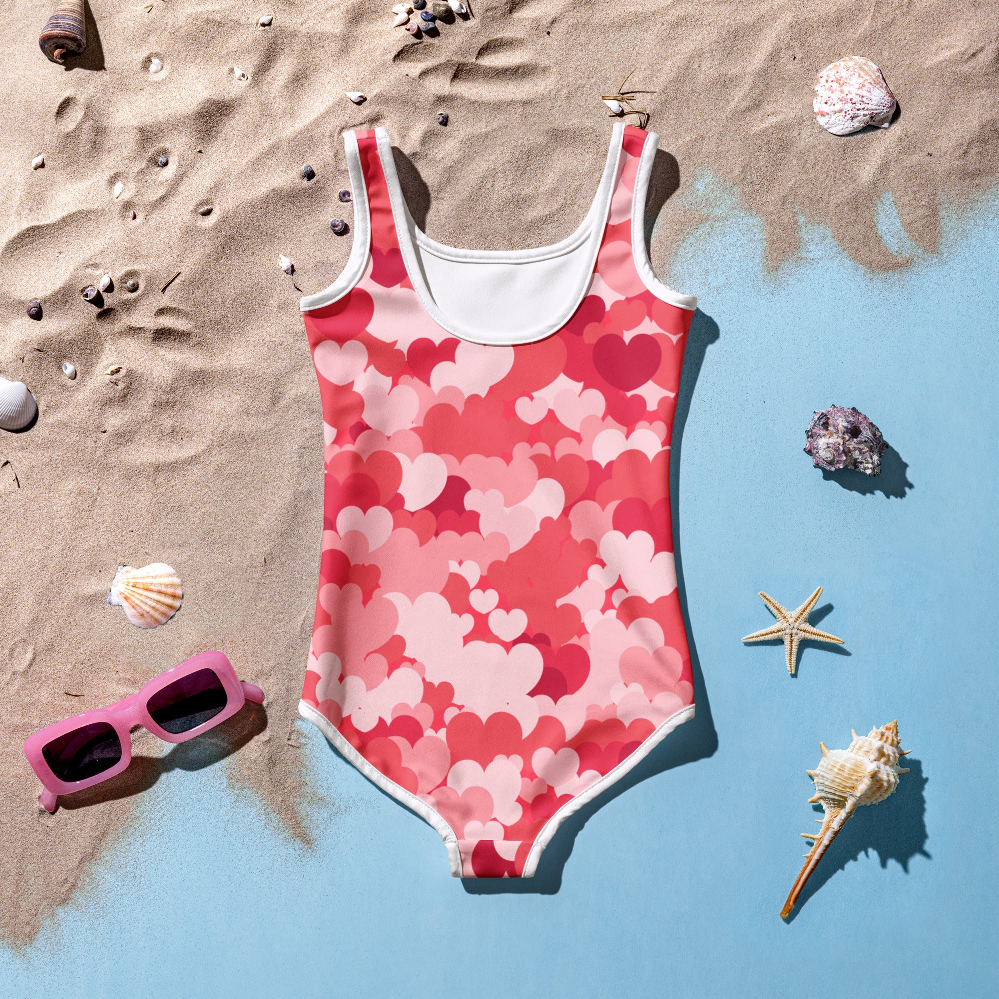 Girls pink heart cloud buttery soft one-piece swimsuit with scoop neckline and UPF 50 plus double layered front