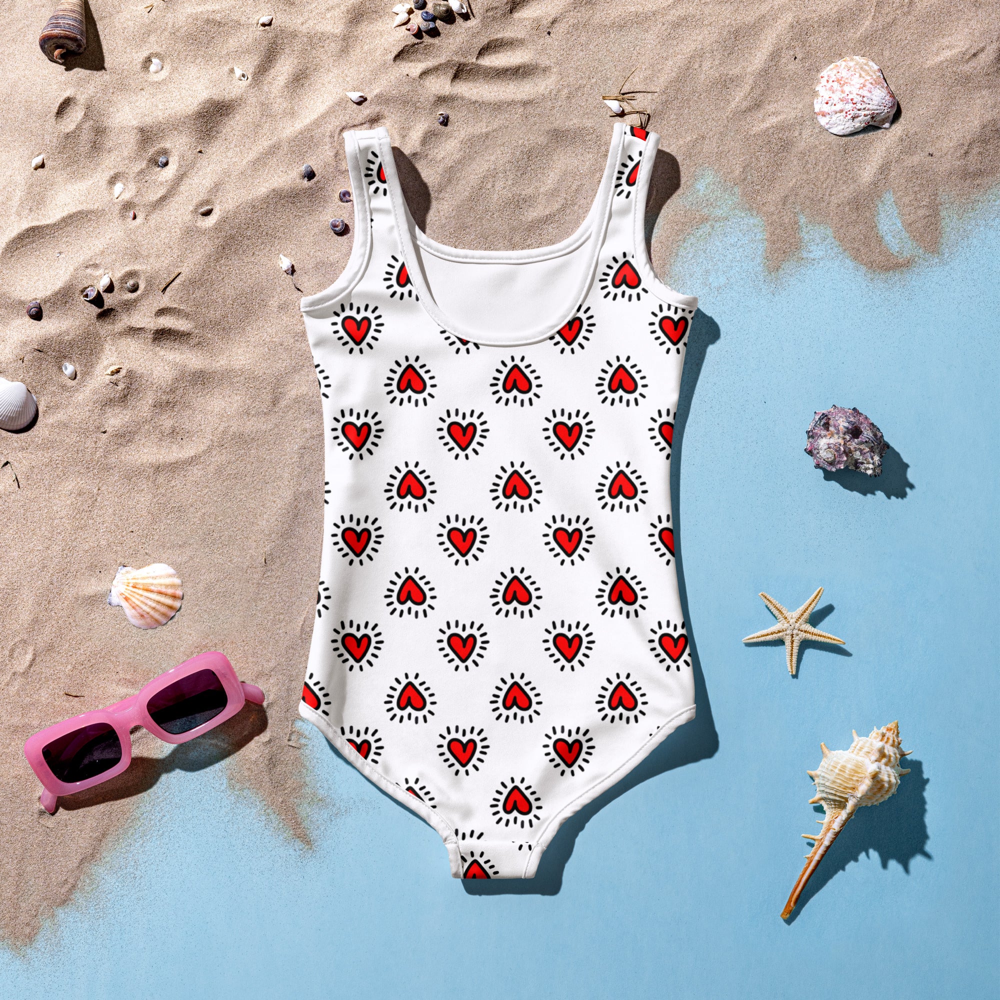 White girls Valentine’s Day one-piece swimsuit with red heart doodle pattern and double layered front with UPF 50+