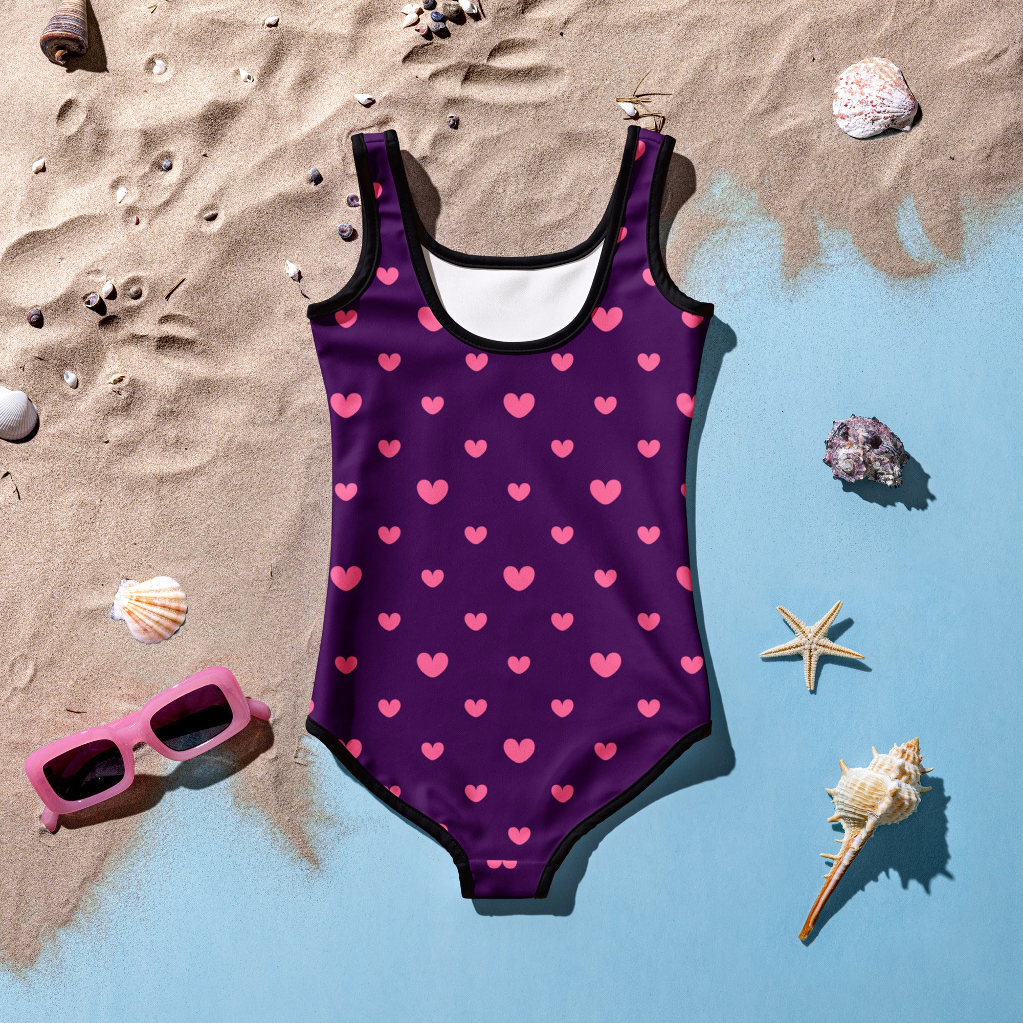 Girls purple Valentine’s Day one-piece swimsuit with pink heart pattern black trim buttery soft UPF 50 plus double layered front