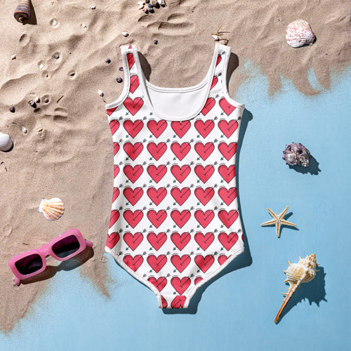 White girls one-piece swimsuit with red hearts pierced by black arrows buttery soft fabric upf 50 double layered front