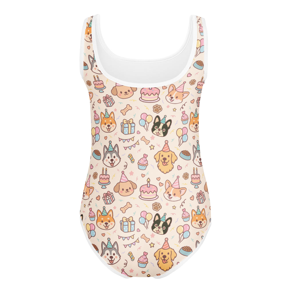 A playful cream one-piece leotard with cartoon dogs and cupcakes quick drying for girls dance and gymnastics