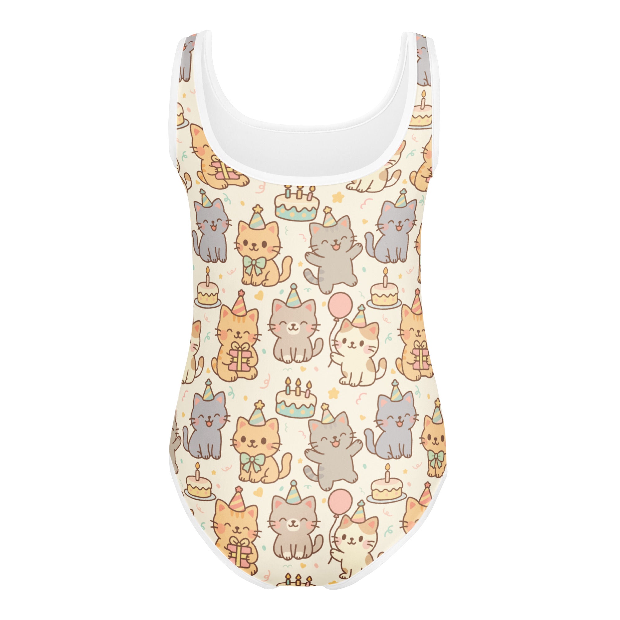 A playful cream-colored buttery soft girls one-piece swimsuit with cartoon cats and birthday cakes for dance and gymnastics