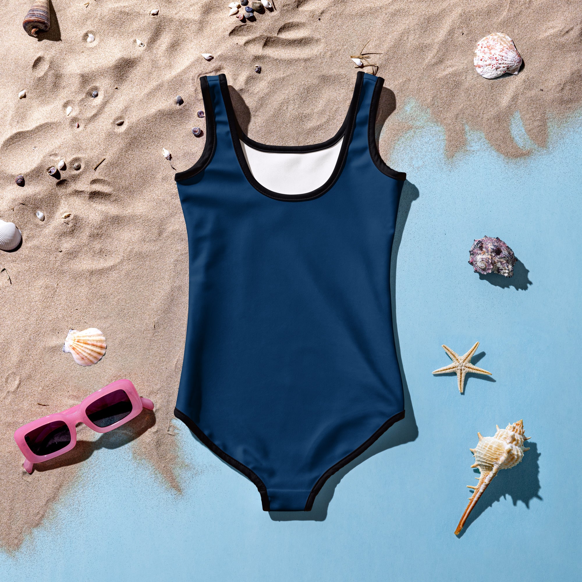 Girls navy blue buttery soft swimsuit with black trim white lining and upf 50 plus double layered front protection