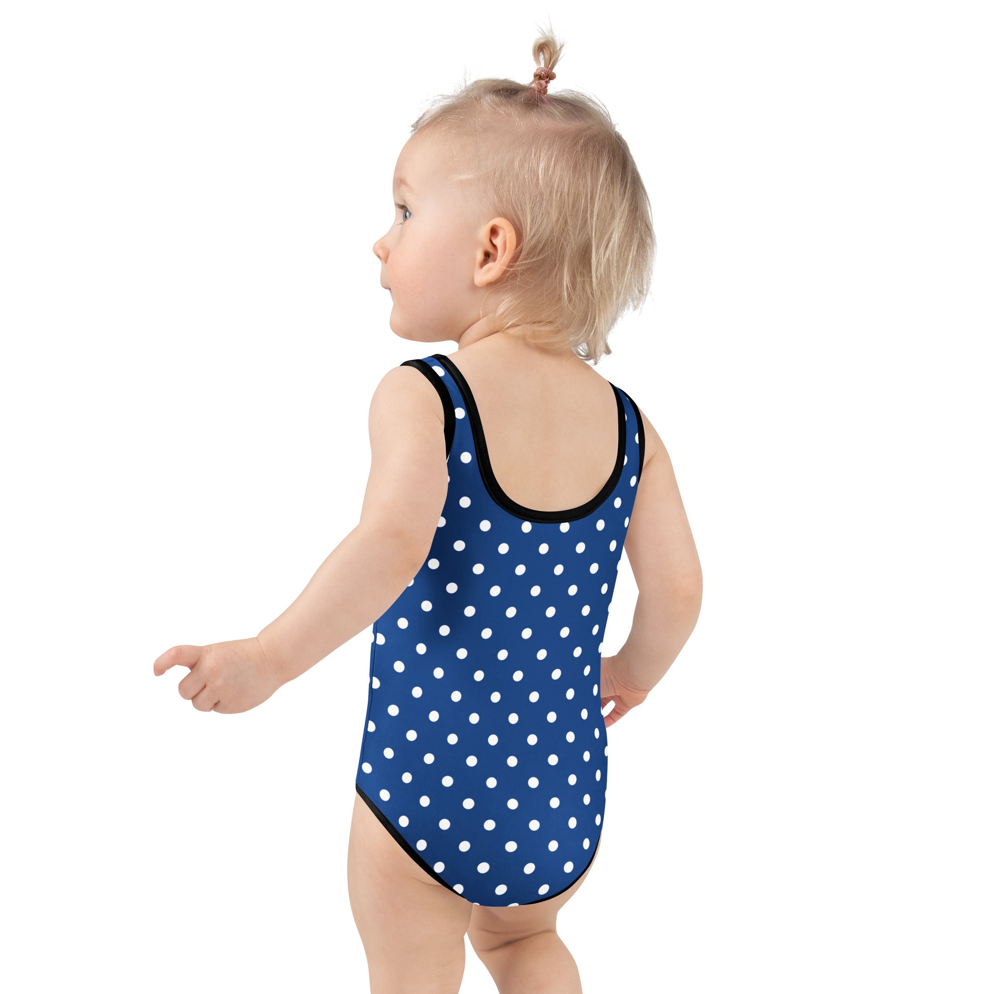 Girls dark blue polka dot buttery soft one-piece swimsuit with black trim and UPF 50 plus double layered front