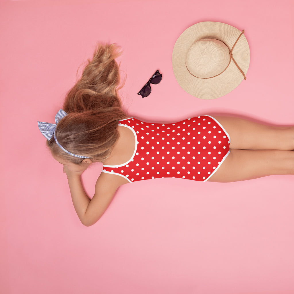 Girls red polka dot buttery soft one-piece swimsuit with white trim and UPF 50 plus double layered front