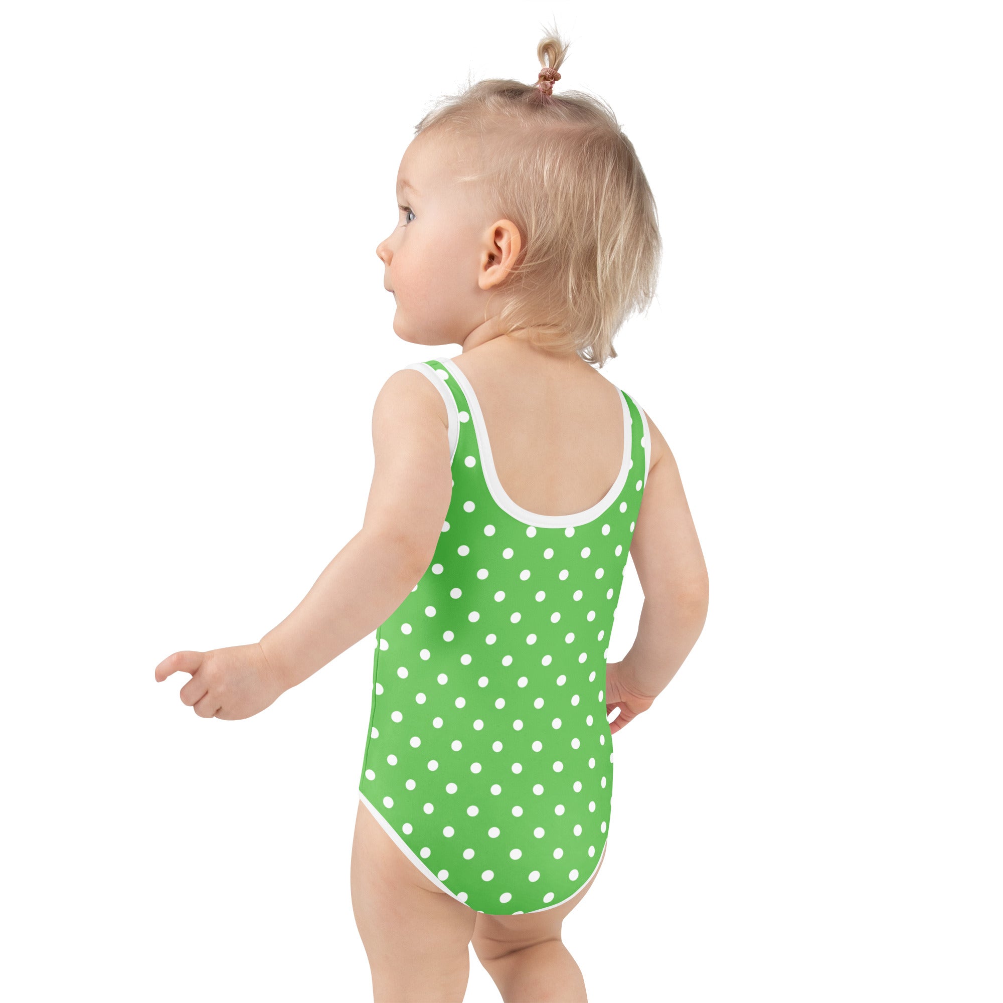 Girls green polka dot buttery soft one-piece swimsuit with white trim and upf 50 plus double layered front