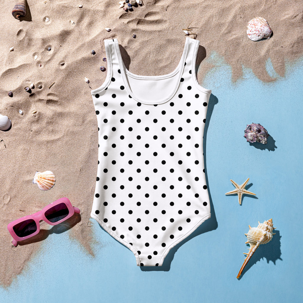 Girls white polka dot buttery soft one-piece swimsuit with scoop neckline sleeveless design and UPF 50+ protection