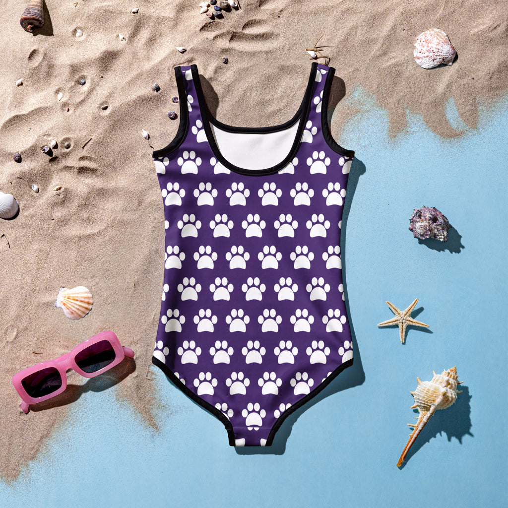 Girls purple paw print buttery soft one-piece swimsuit with white paw prints black trim and upf 50 plus protection