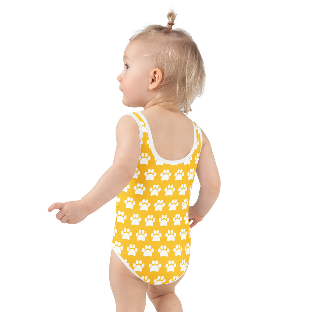 Girls yellow buttery soft one-piece swimsuit with white paw print pattern white trim and UPF 50 plus protection