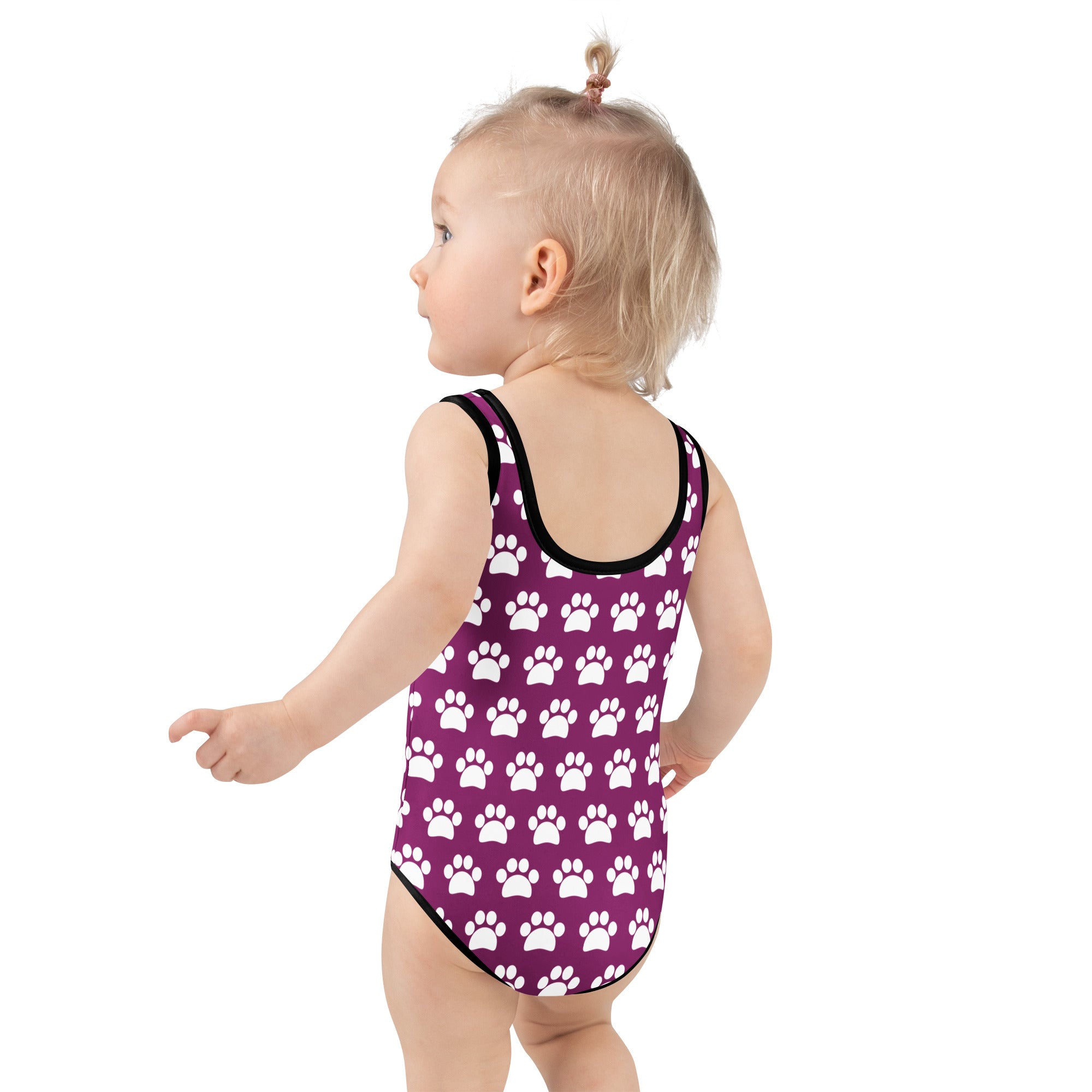 Girls purple paw print buttery soft swimsuit with upf 50 plus and black trim in one piece design
