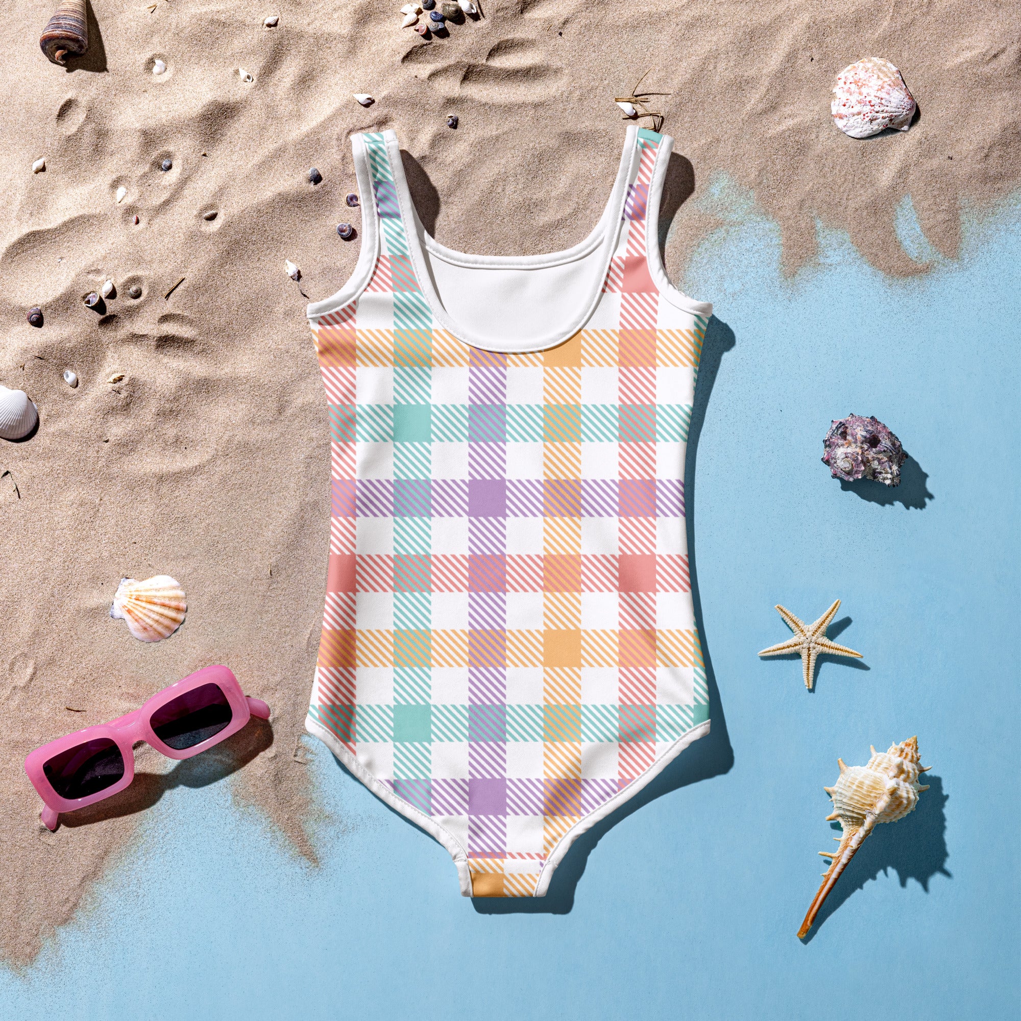 Girls pastel rainbow gingham one-piece swimsuit with white trim buttery soft fabric and UPF 50+ protection