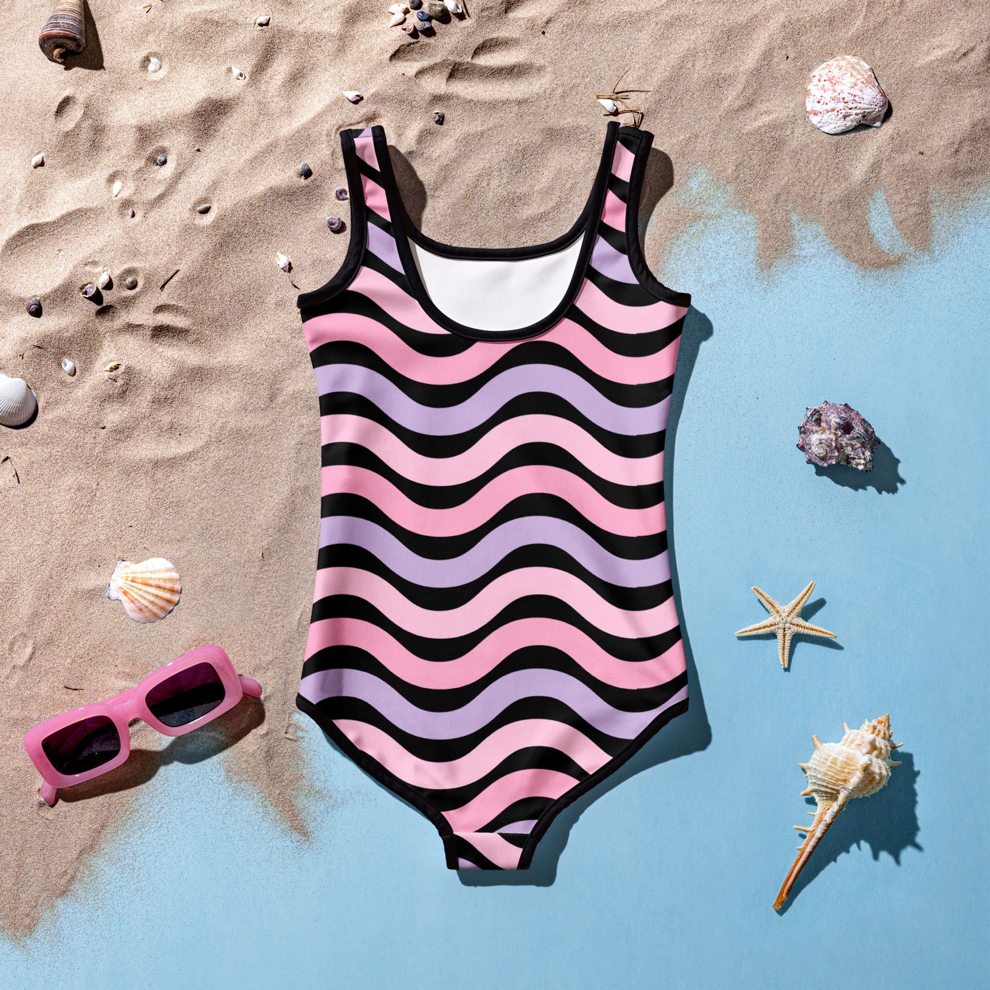 Girls pink and lavender wavy stripe buttery soft one-piece swimsuit with white lining and thin straps upf 50+ double layered front