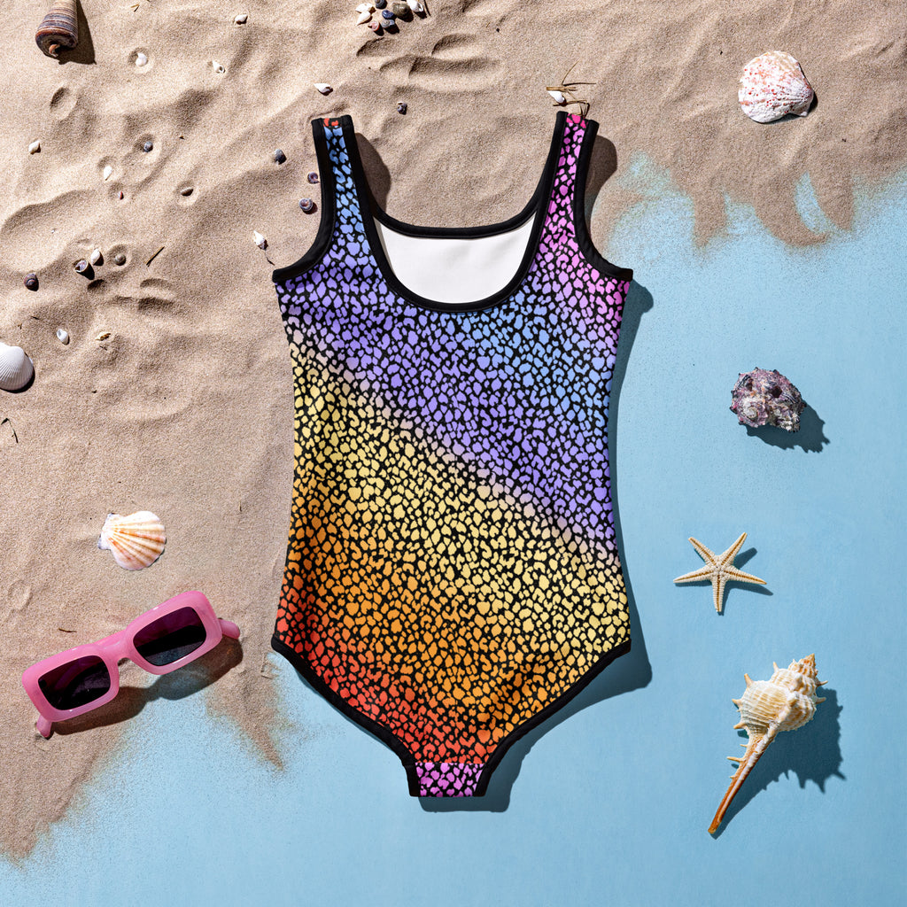 Girls colorful leopard print one-piece swimsuit with rainbow gradient and black trim made of buttery soft fabric upf 50+