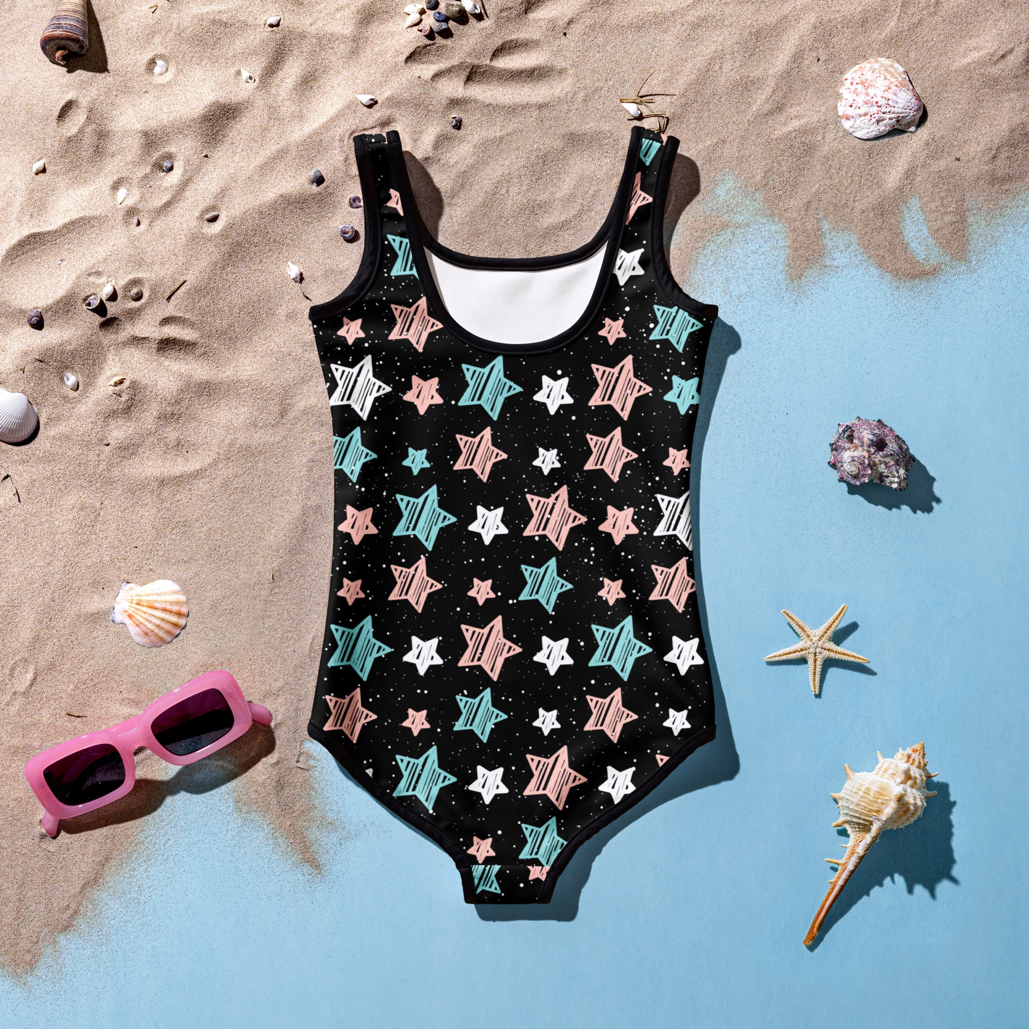 Girls starry night doodle stars buttery soft black one-piece swimsuit with pastel star pattern and UPF 50 plus protection