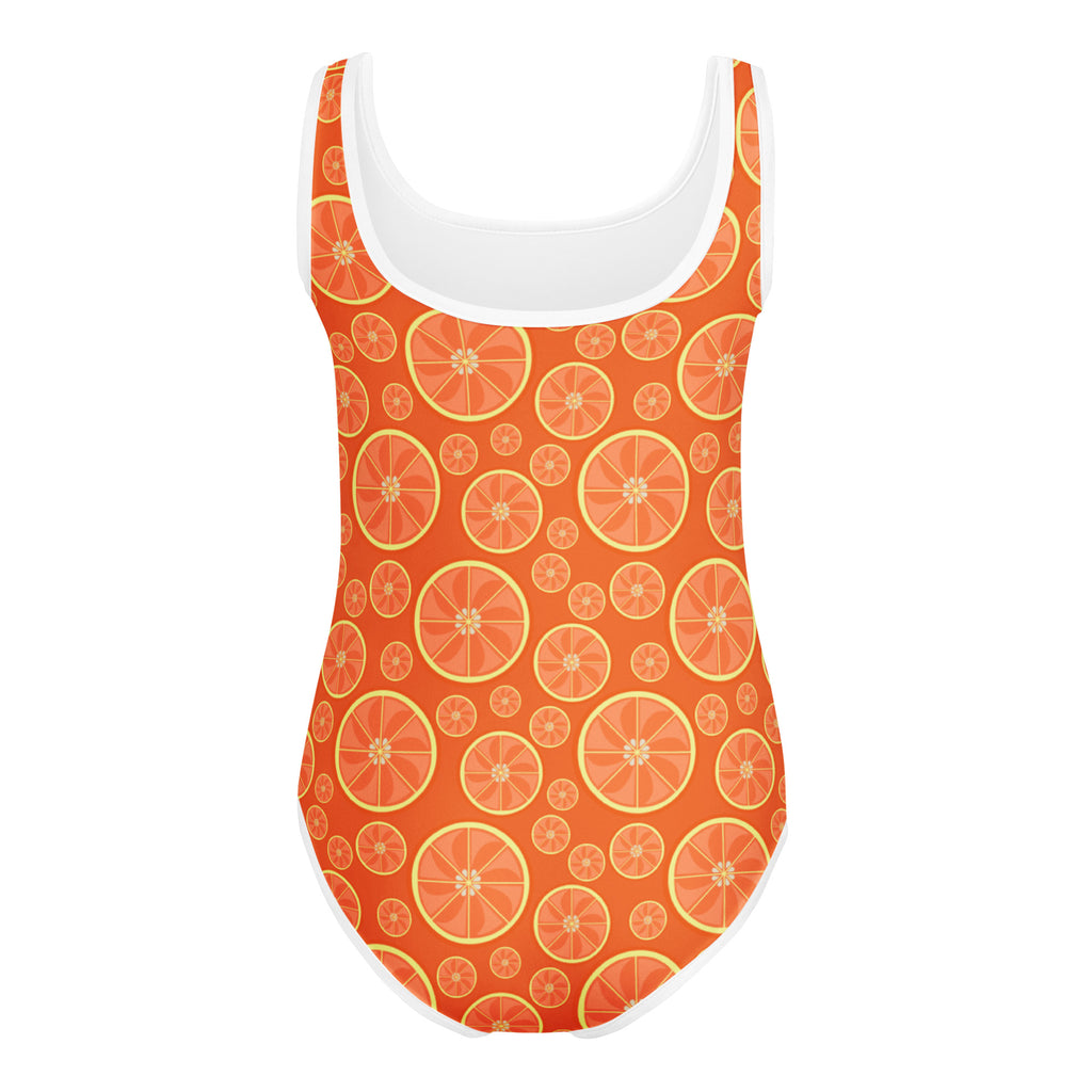 A vibrant orange girls leotard with sliced orange pattern yellow outlines white trim quick drying for dance and gymnastics
