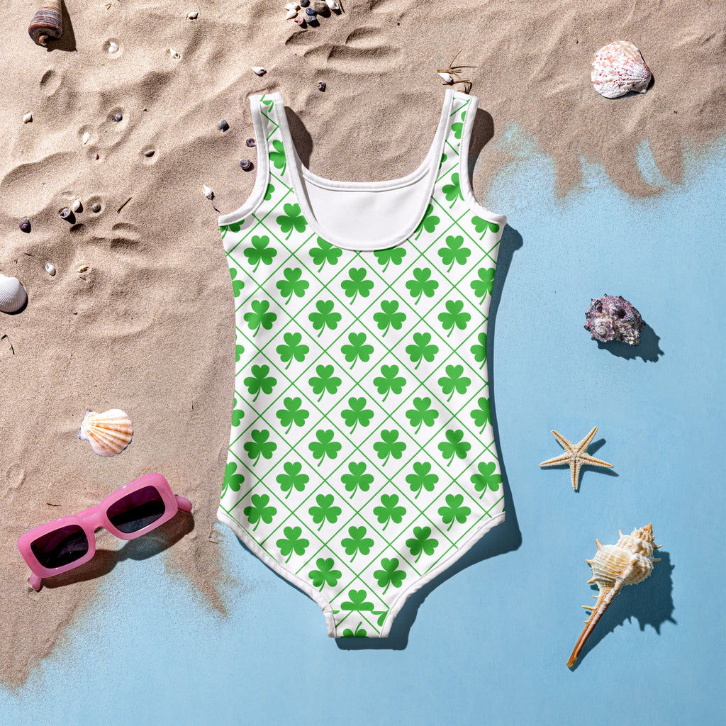 Girls St Patricks Day white one-piece swimsuit with green shamrocks buttery soft fabric and UPF 50+ protection