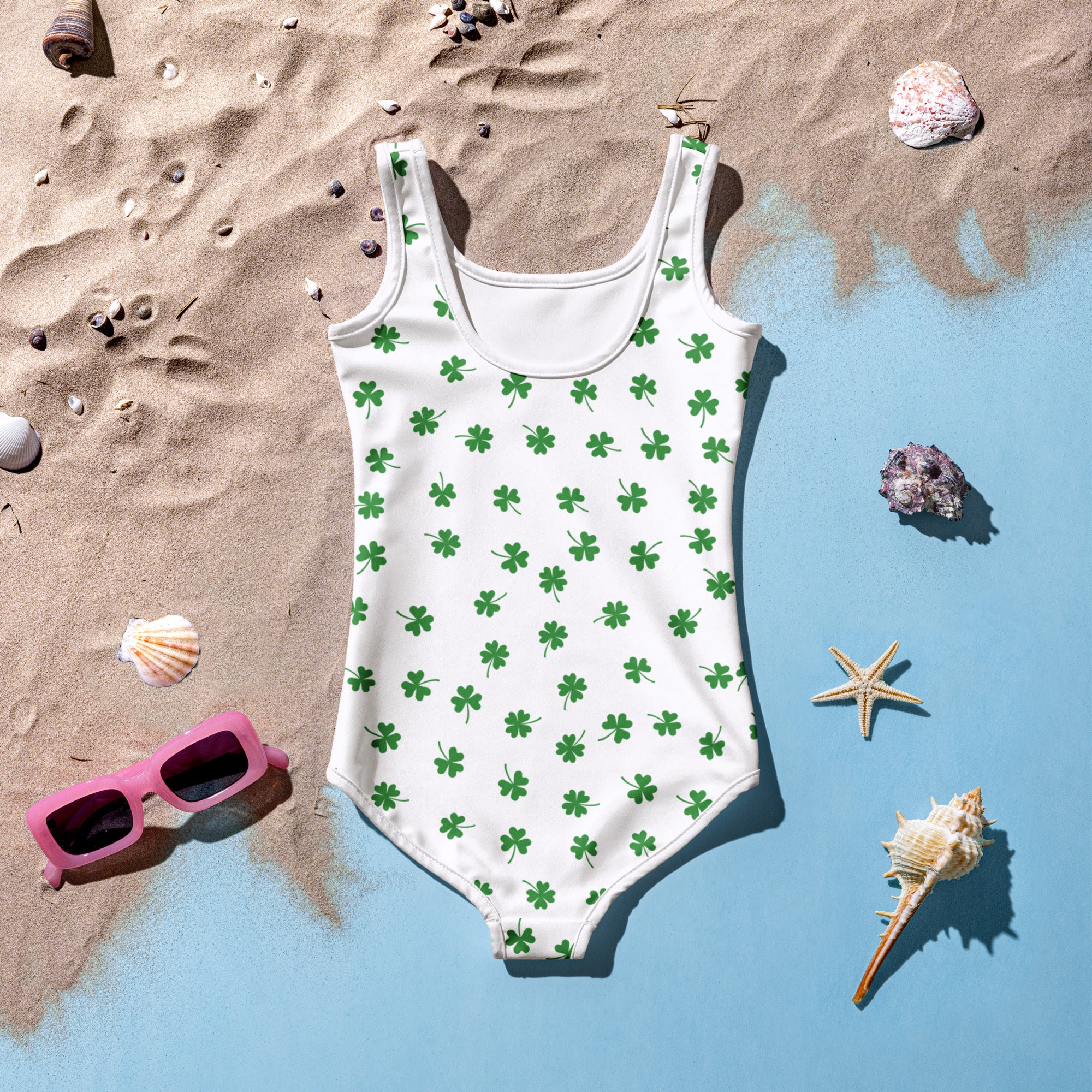 Girls shamrock buttery soft white one-piece swimsuit with green four-leaf clover pattern and upf 50+ protection