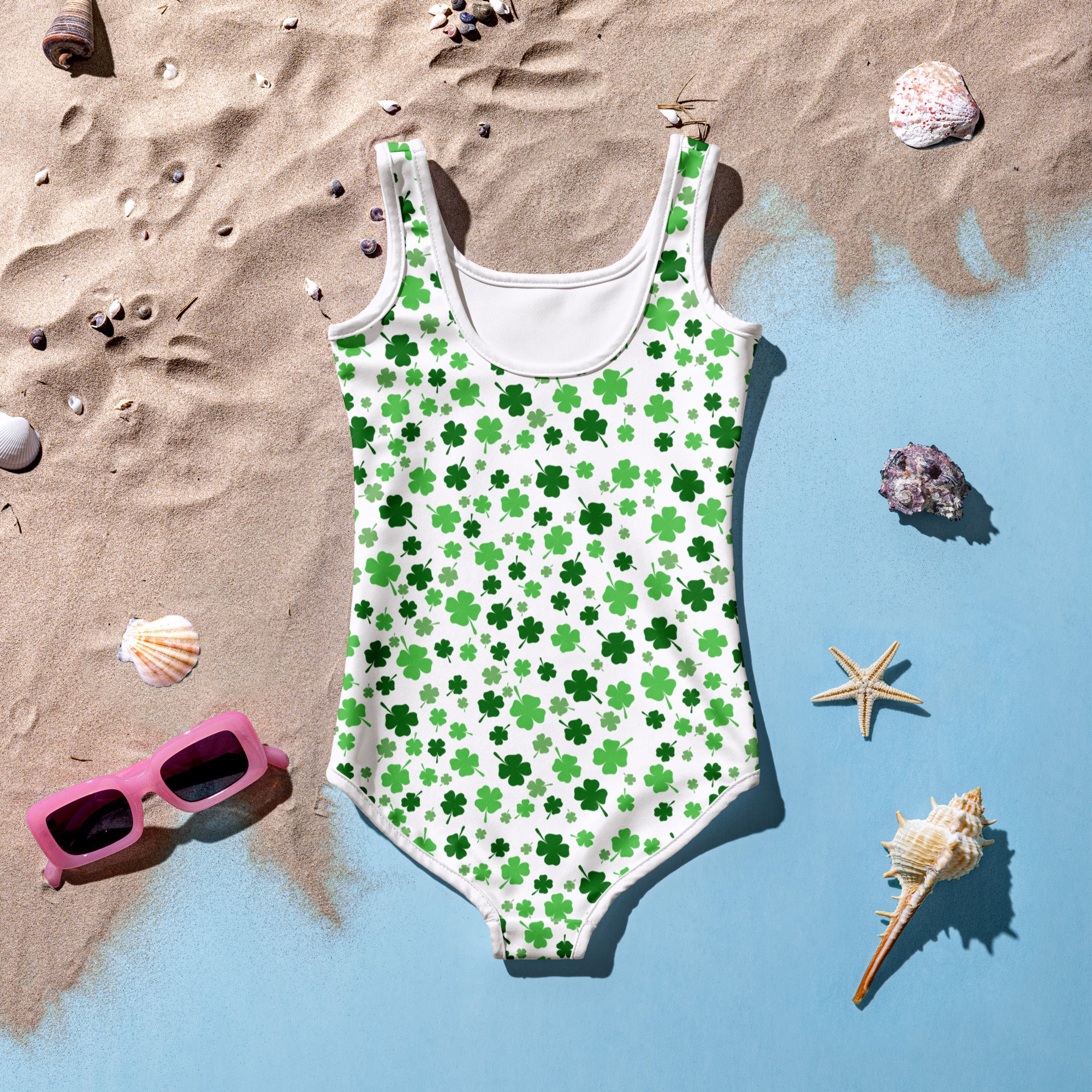 White girls one-piece swimsuit with green shamrock print buttery soft fabric and upf 50 plus protection