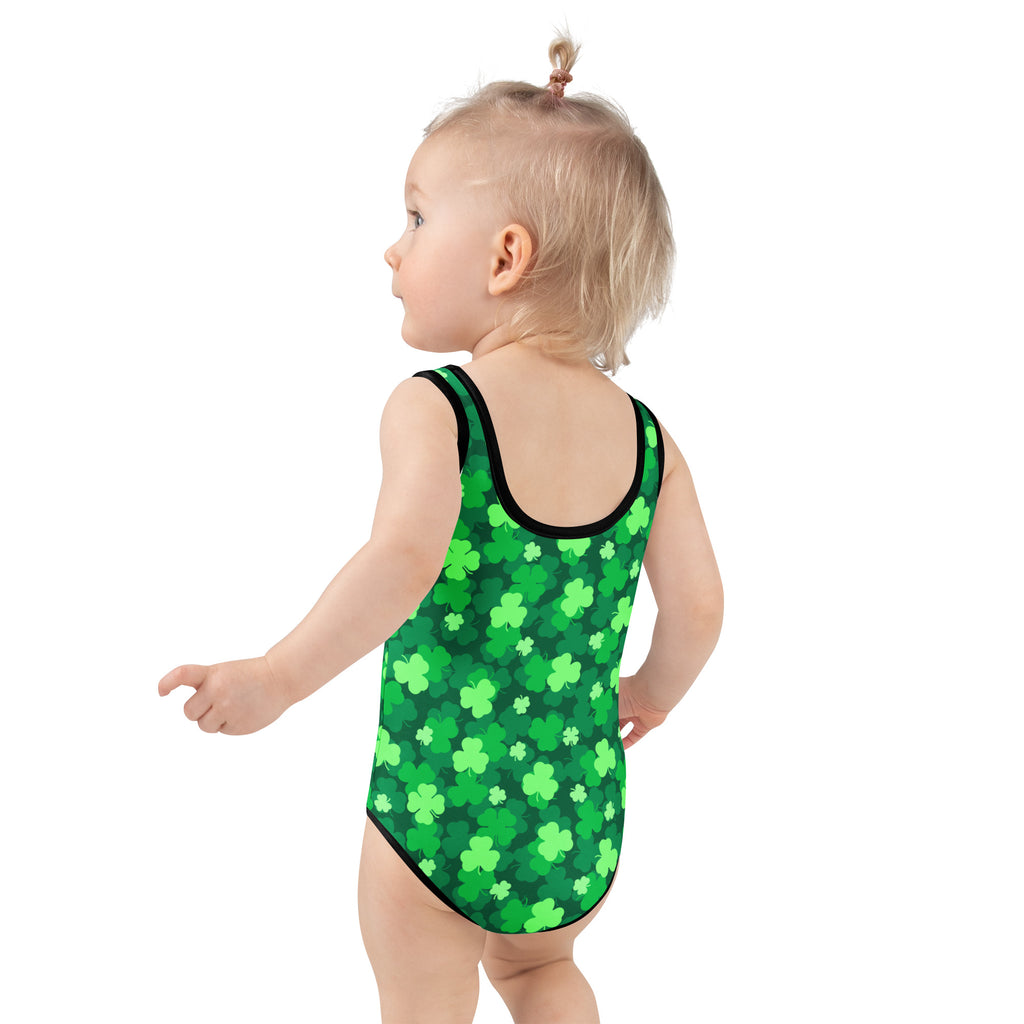 Girls green shamrock patterned buttery soft one-piece swimsuit with black trim and UPF 50 plus protection